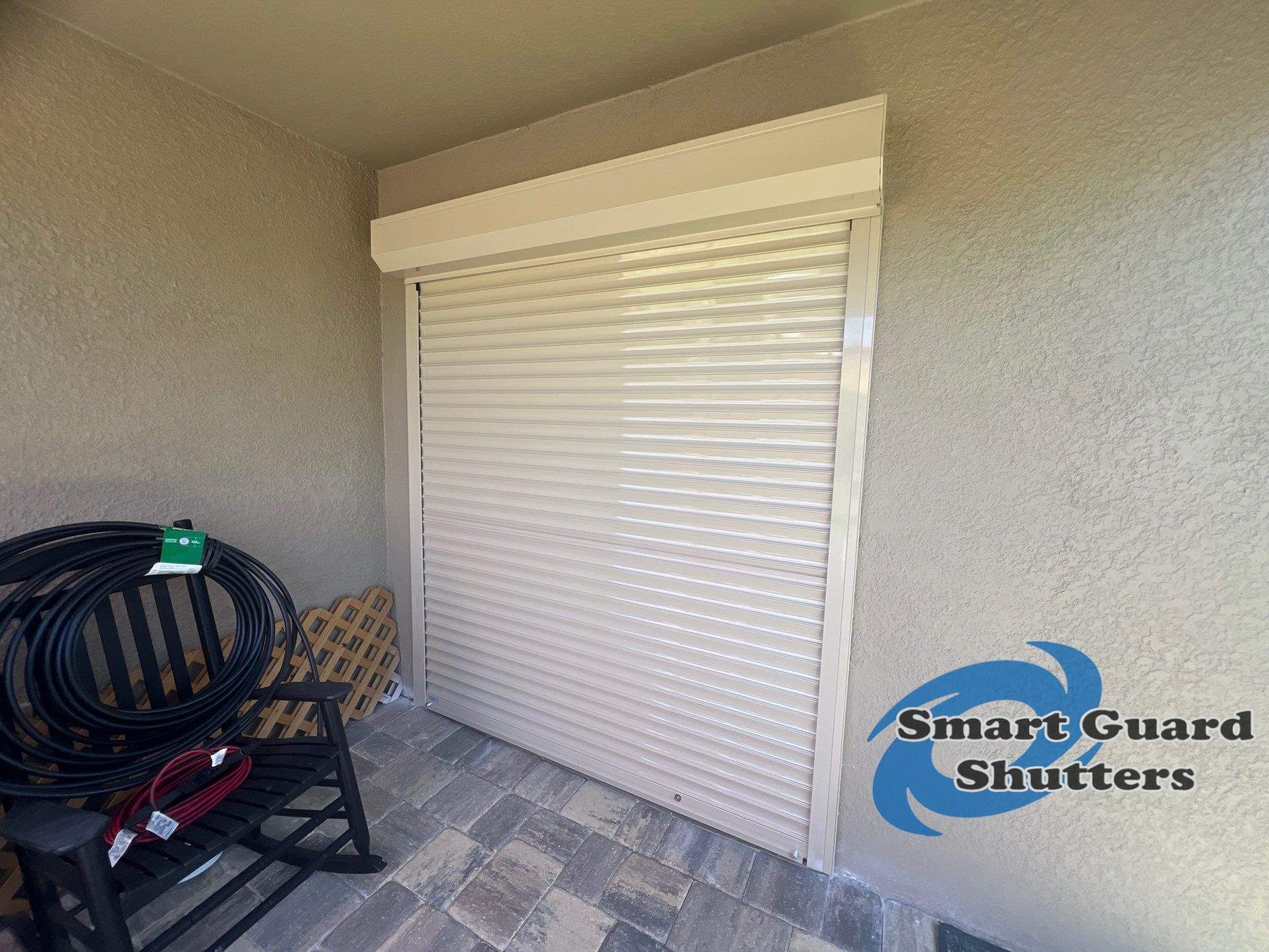 Hurricane protection in Beige/White by Smart Guard Shutters
