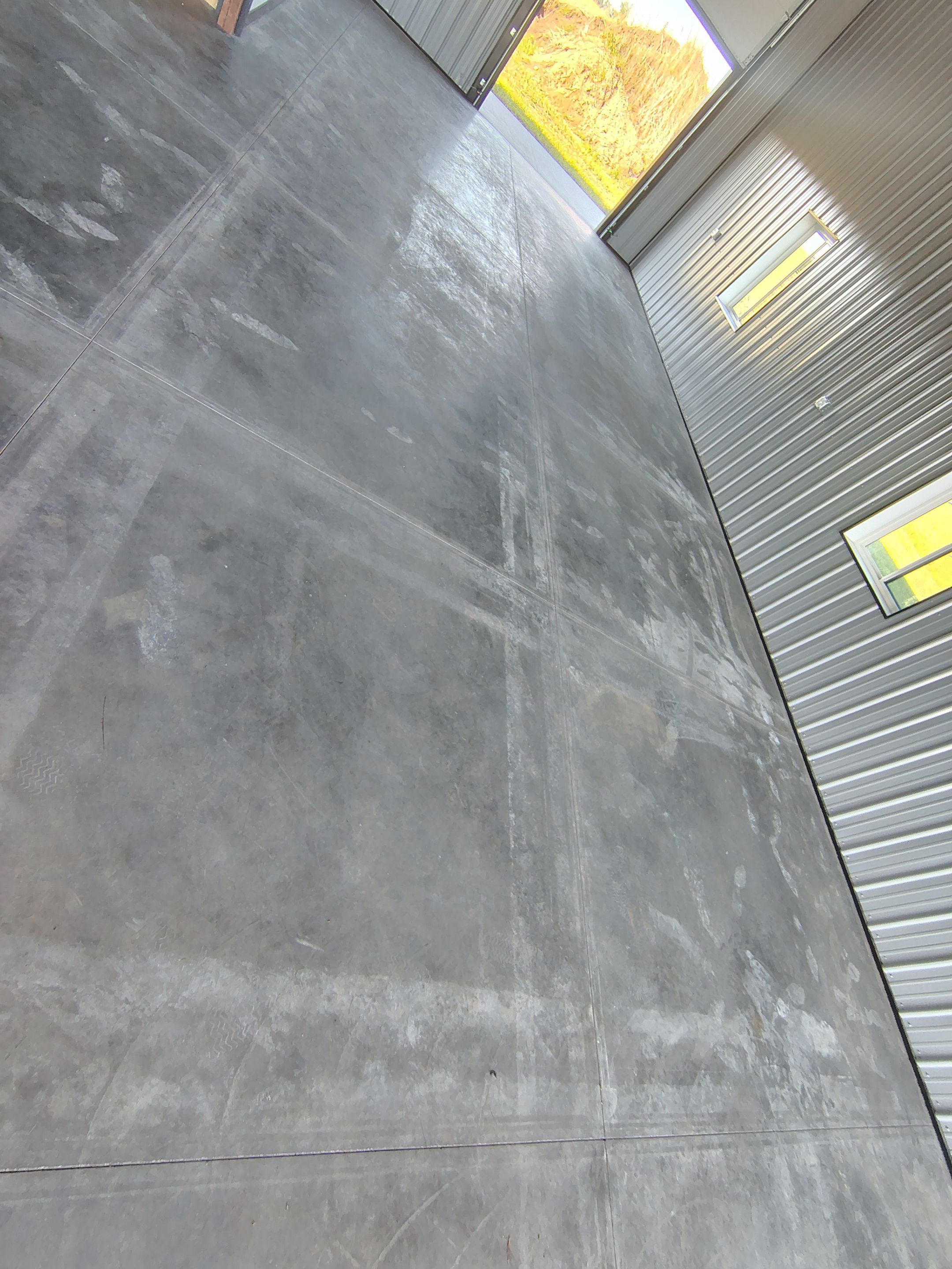 Polyaspartic Garage Floor Coating with Decorative Flake in Wentworth by Select Painting, Coatings & Garage Cabinets