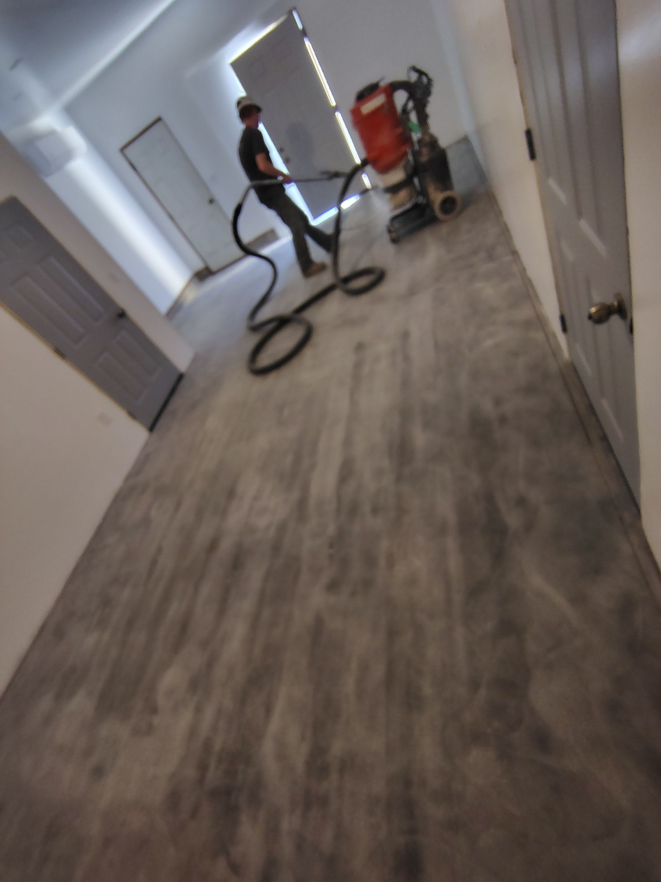 Decorative Chip Concrete Coating Installation in Luverne by Select Painting, Coatings & Garage Cabinets