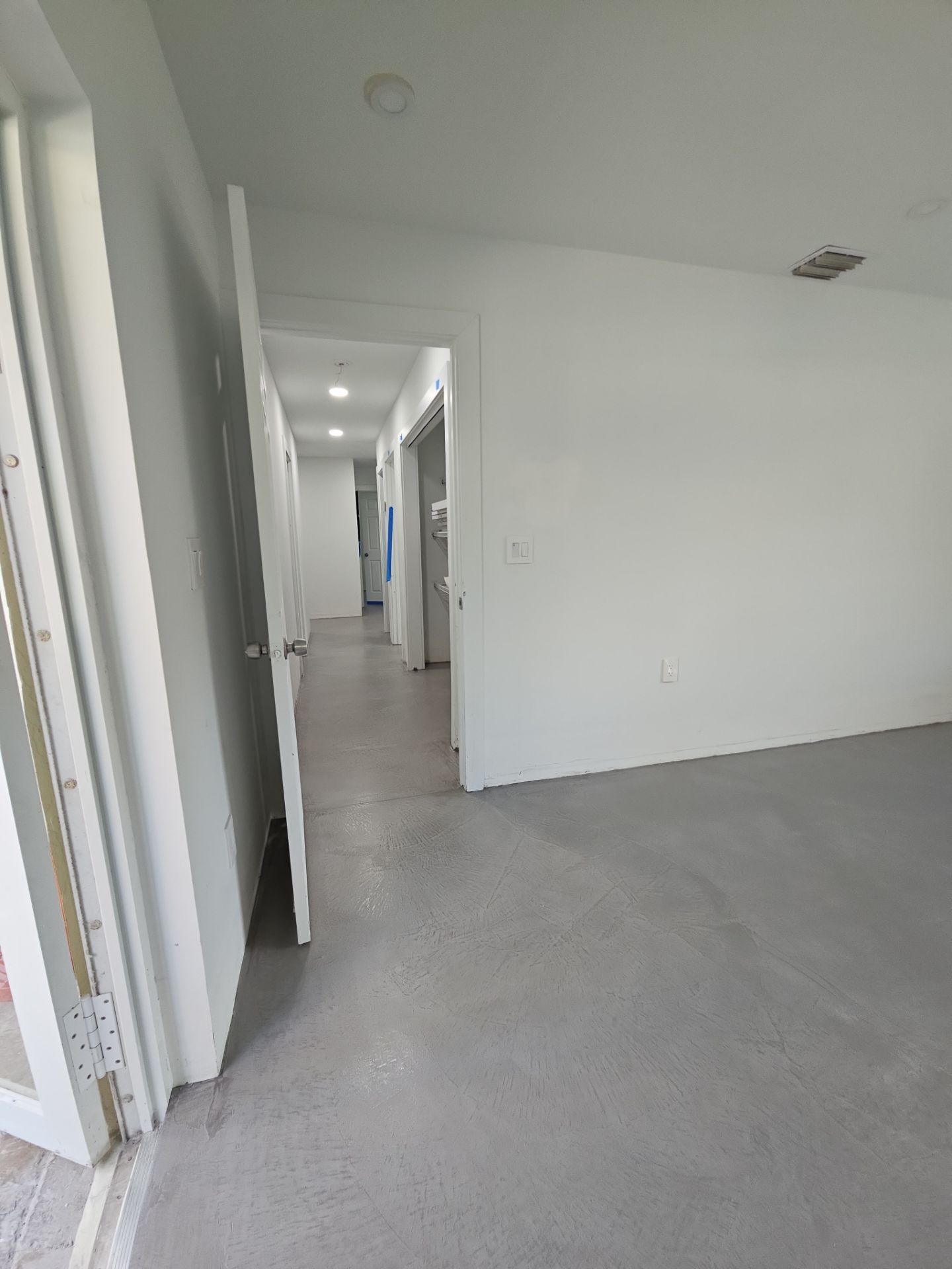 Home Floor Resurfacing w/Microtopping by Seamless Surfaces