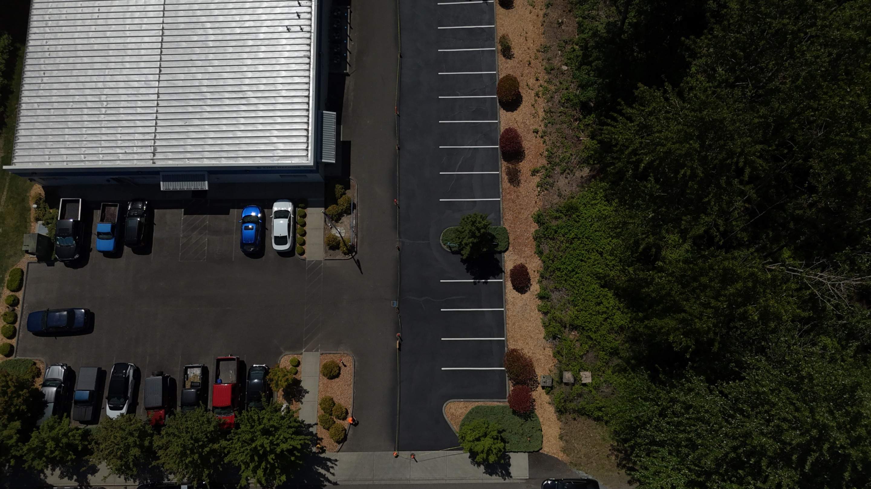 King Machine Business Parking Lot Sealcoat Overlay | Mukilteo by Jireh Asphalt & Concrete Inc 