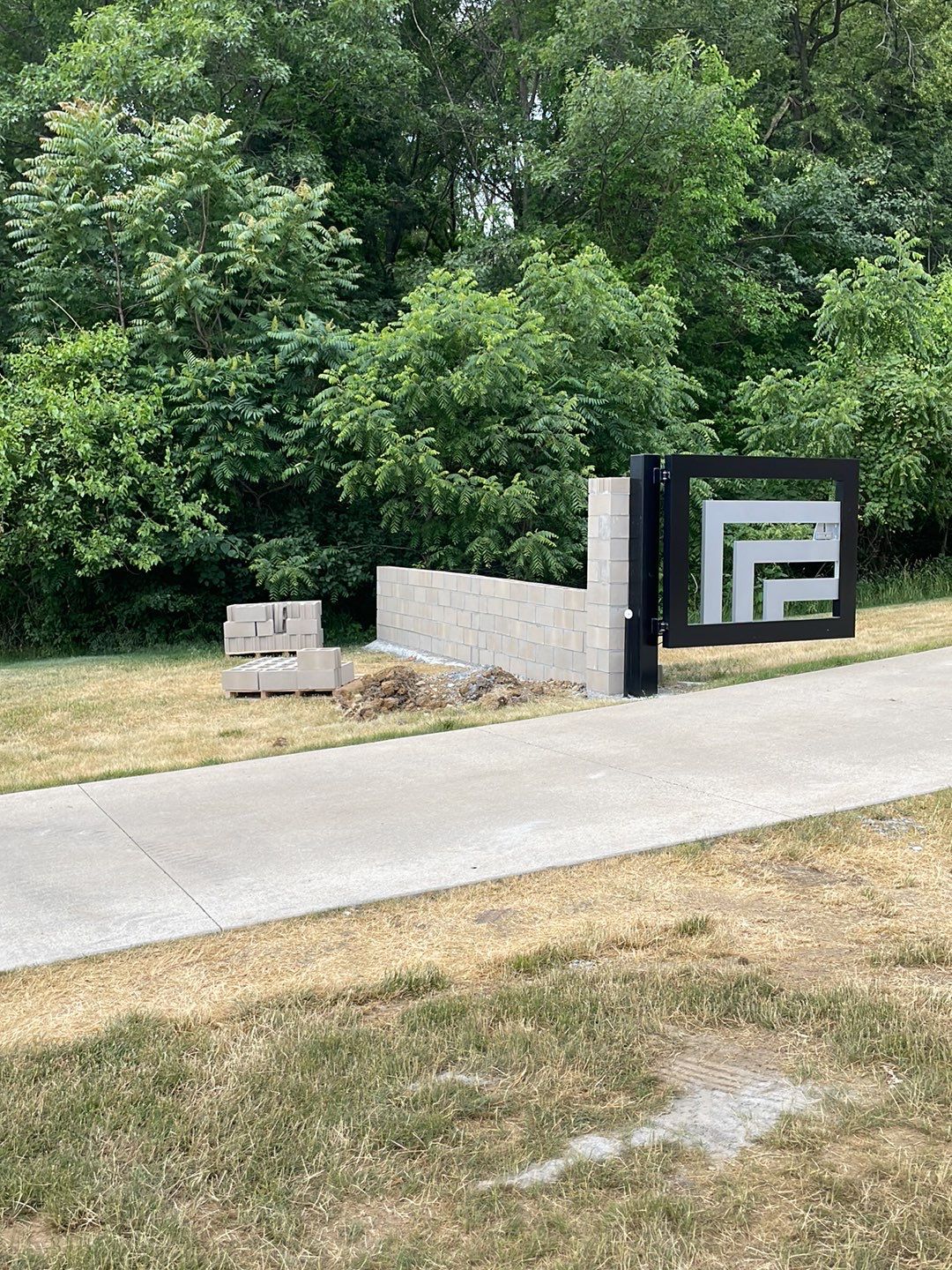 Fence / Retaining Wall using Block then parge by ACE Waterproofing & Basement Solutions