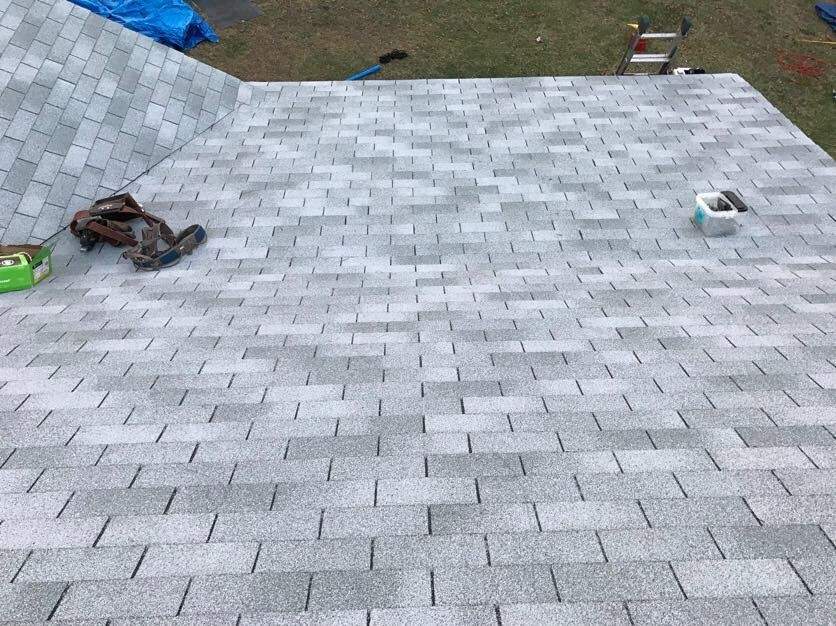 Residential Roofing Installation  3 Tap Shingles by Alpha Design Services