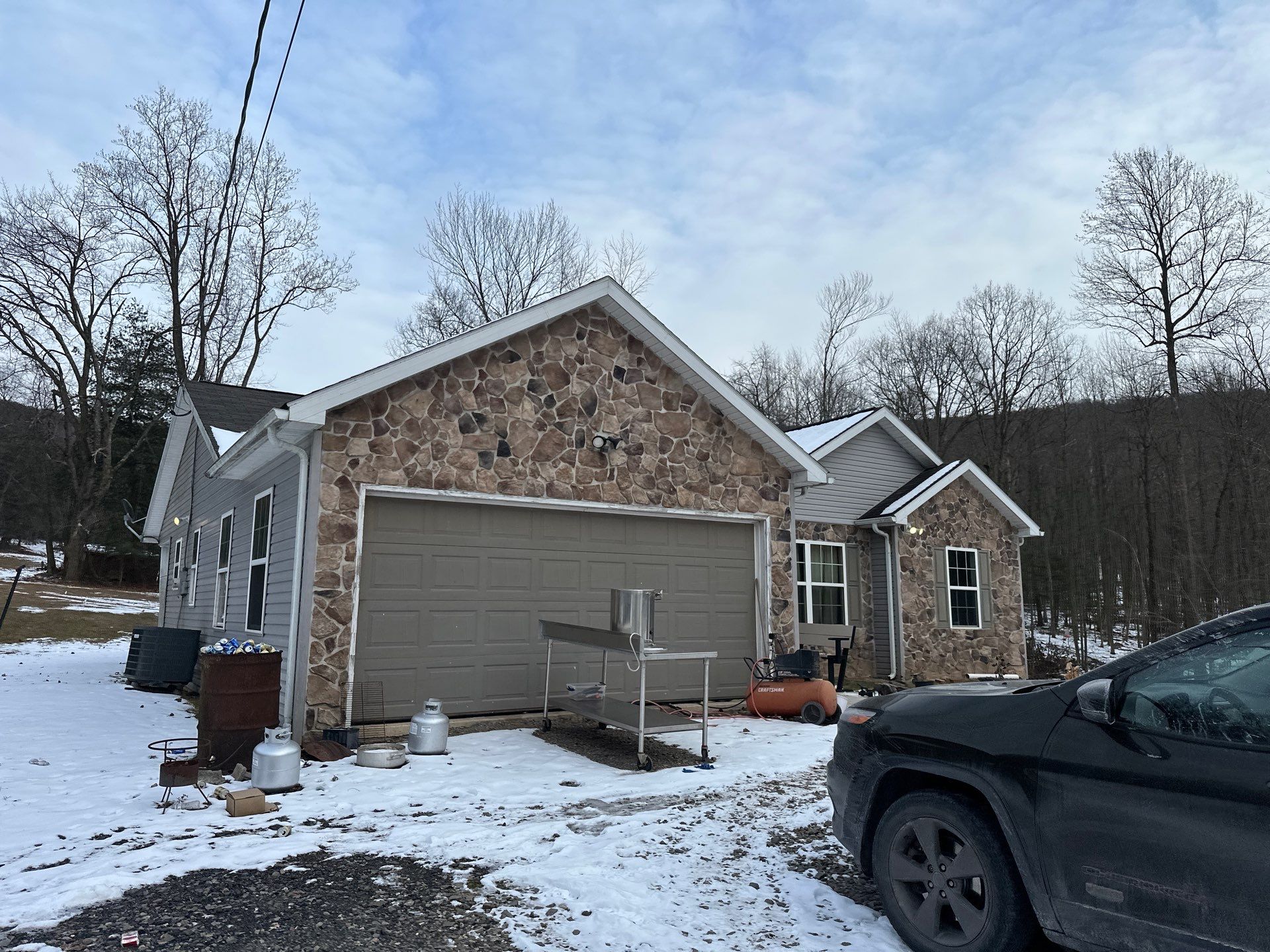 Black Metal Roof Replacement and Gutter Installation in Halifax by Esh Builders