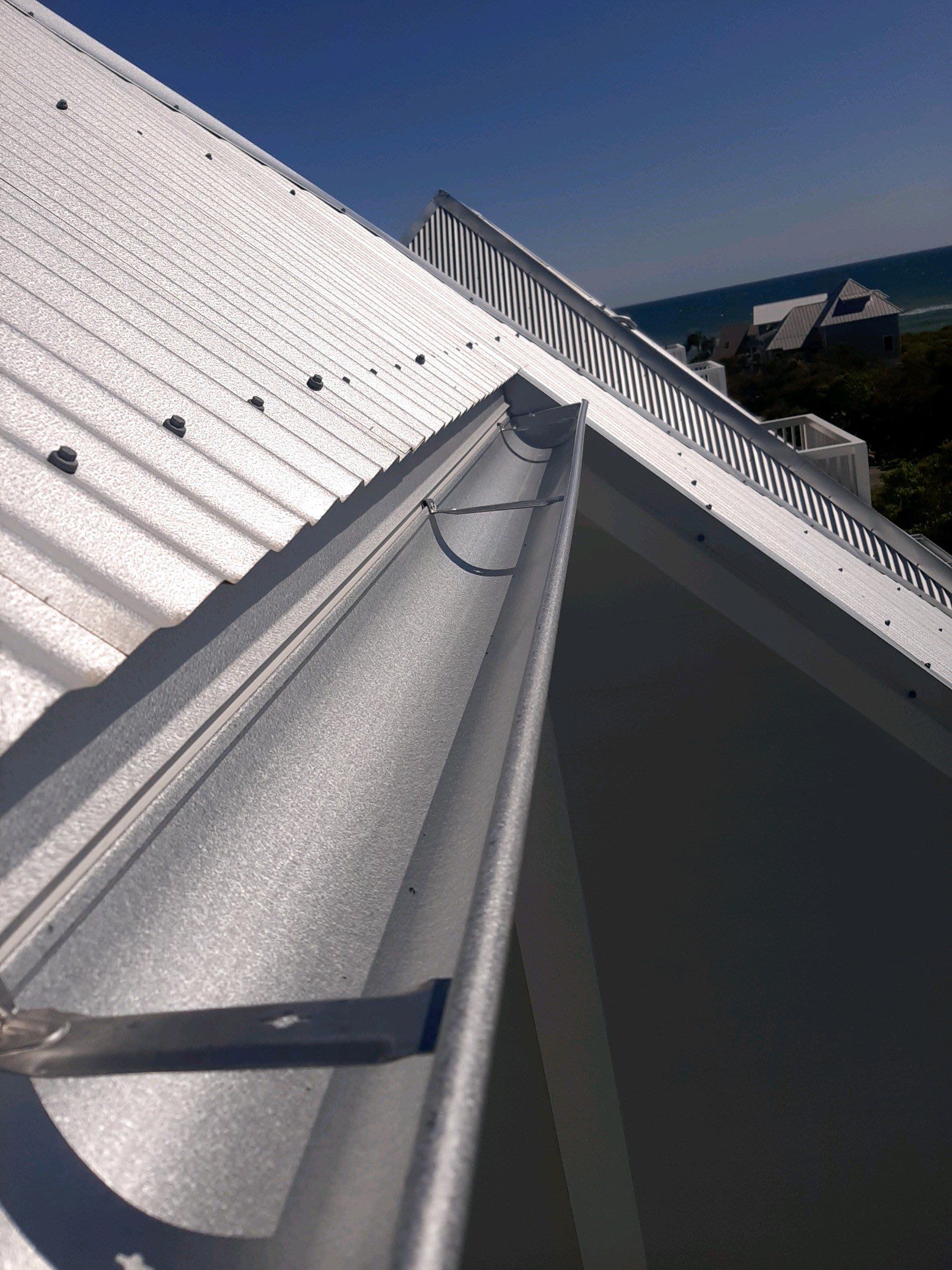 Seamless Gutter Installation Using Galvalume Half Round Gutters by Gutter Professors