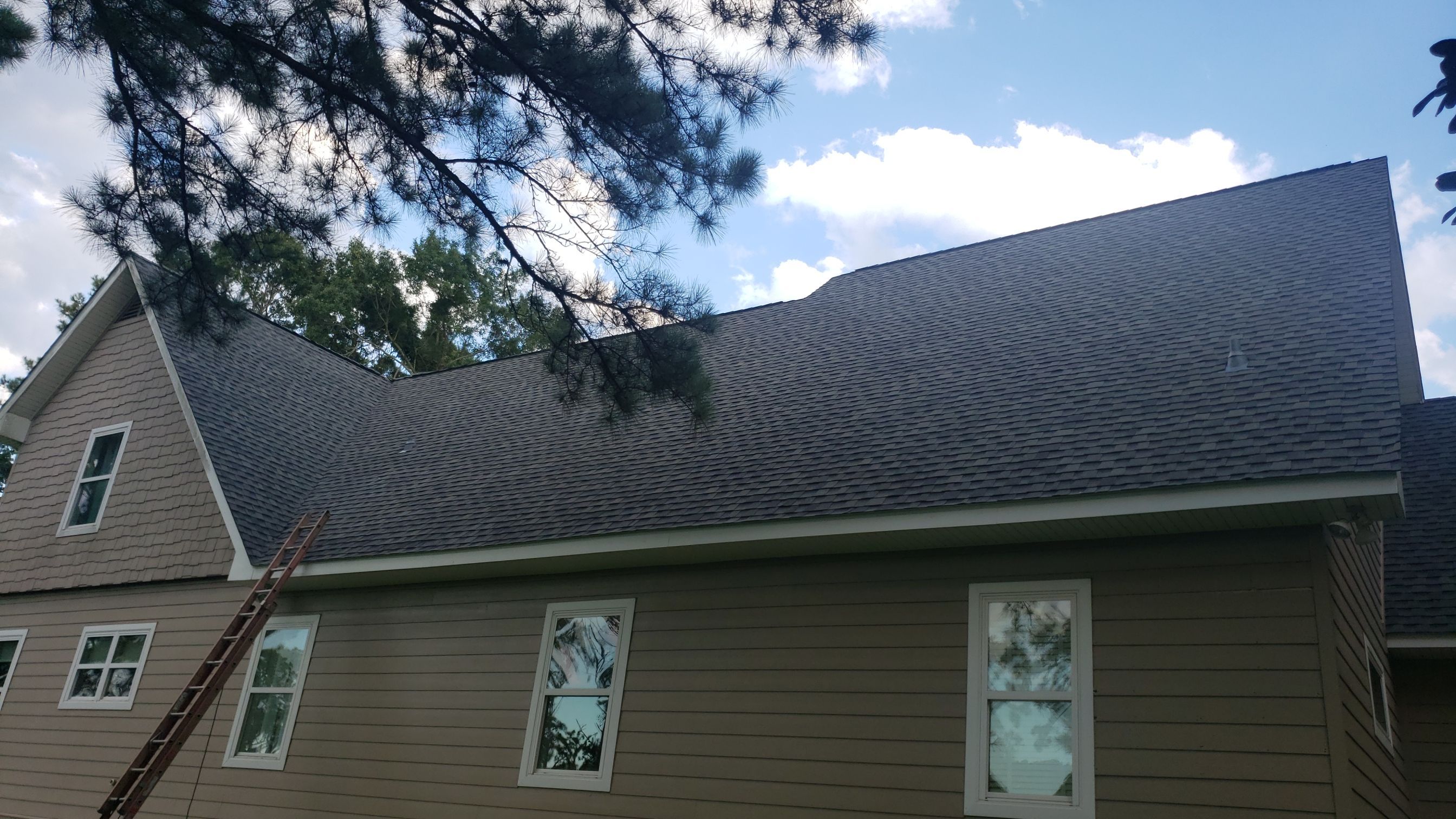Residential Roofing Installation using Roof Replacement by American Roofing & Construction LLC