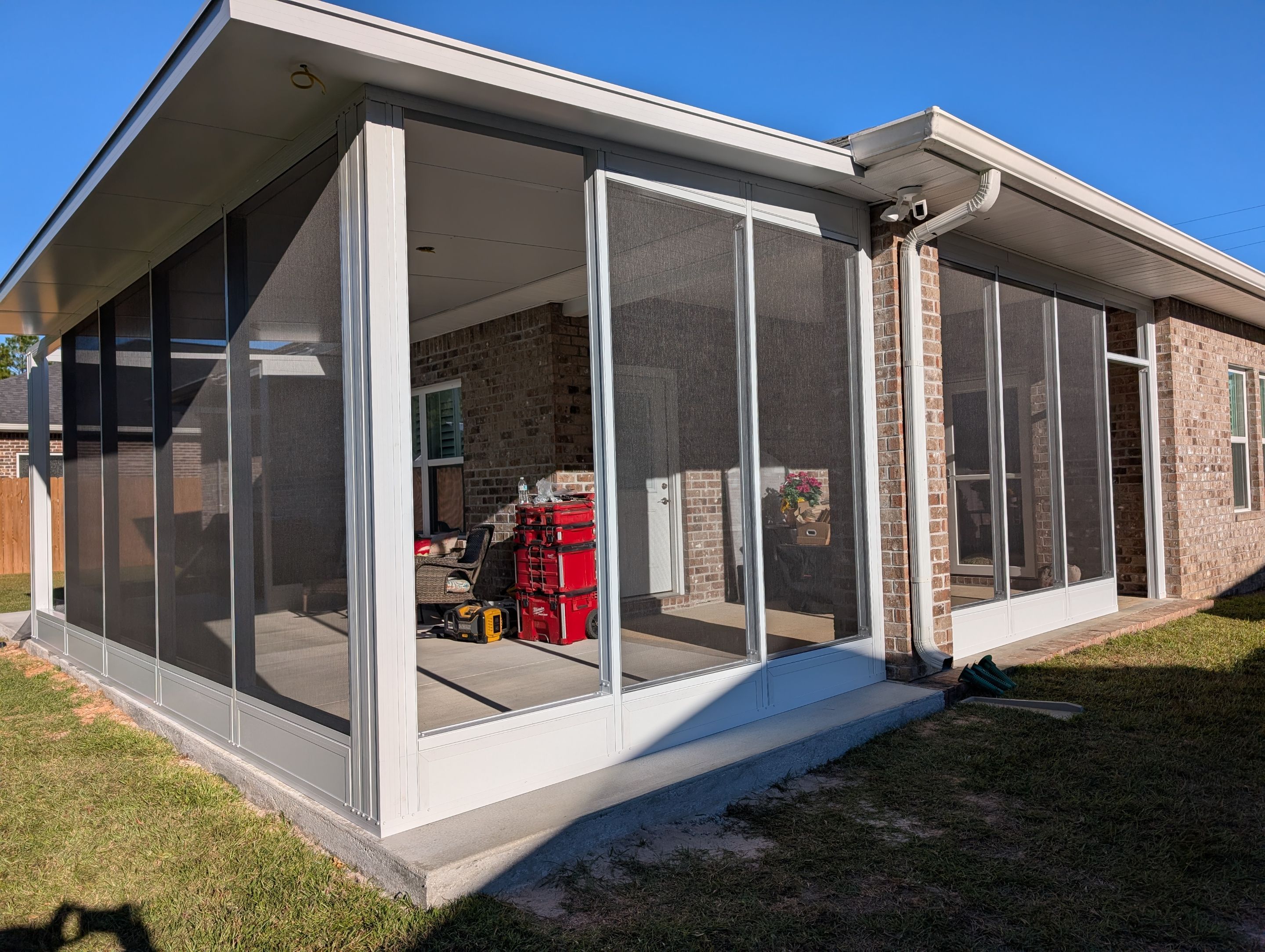 Home addition w/Vinyl 4-Track Windows by Titan Sunrooms