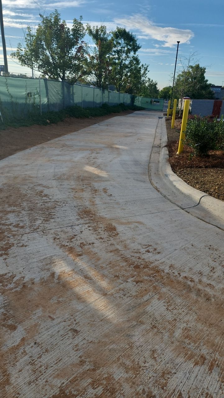 Driveway Clean using cleaner by Power Wash Masters LLC