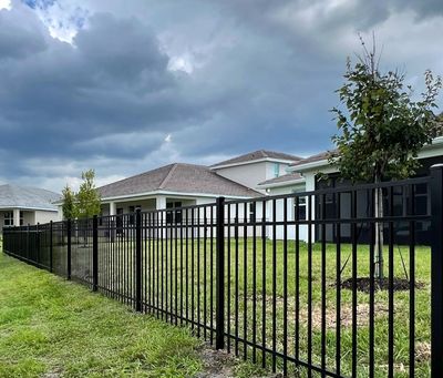 Aluminum Fence Installation using Black 3 Rail Aluminum Fence