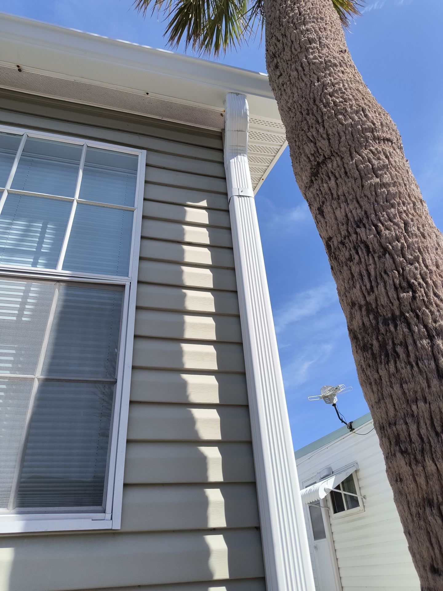 White K-Style Gutters for Beach Homes in Longboat Key FL by Gutter Professors
