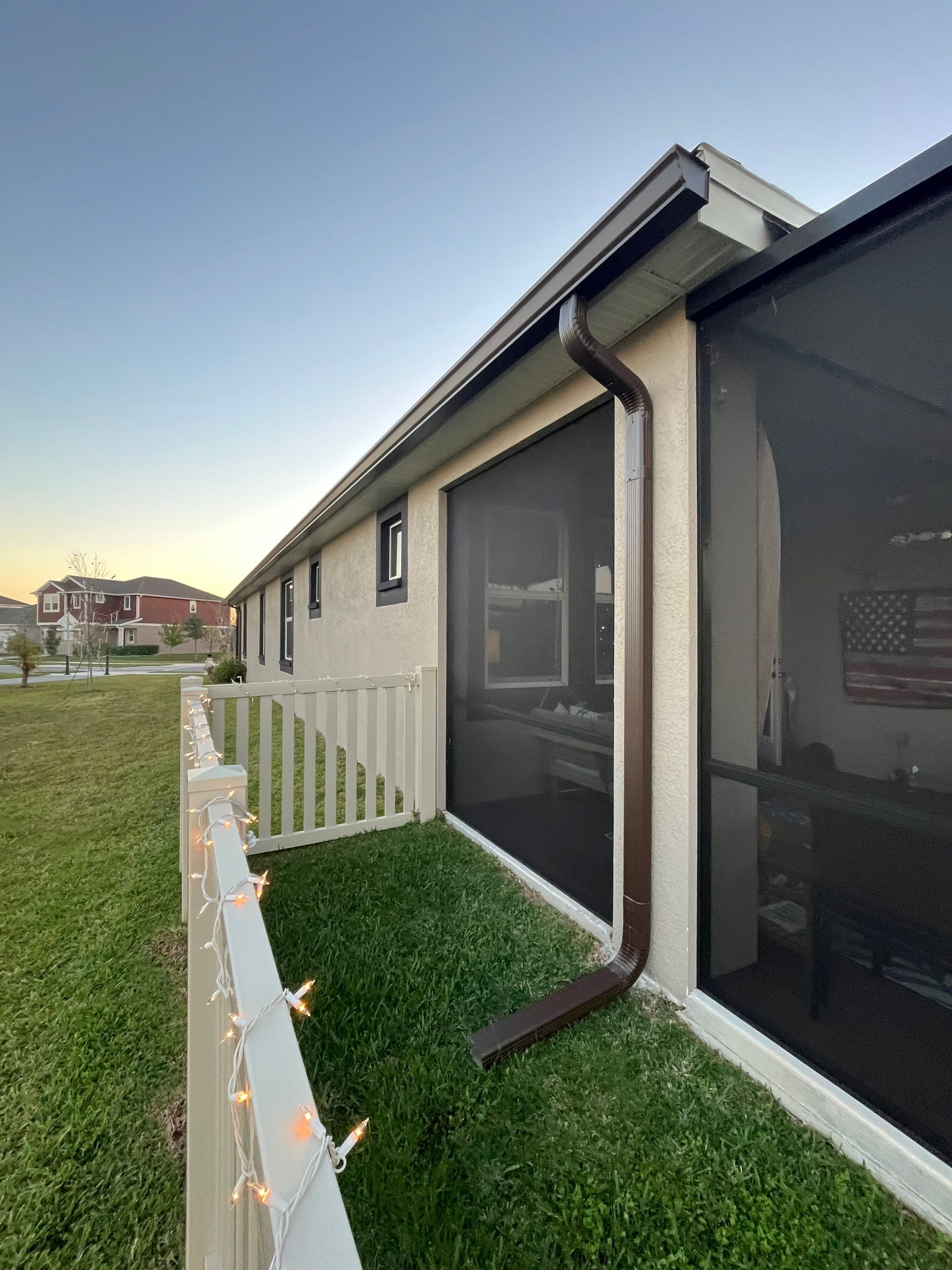 3X4 elbow Downspouts using Musket Brown Seamless Gutters in Lakeland FL by Gutter Professors