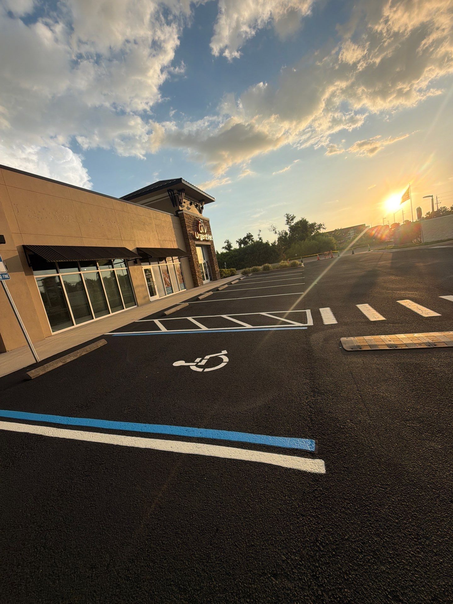 Commercial Asphalt Sealcoating and Line Striping at School House Plaza by Everline Coatings & Services - Southwest FL