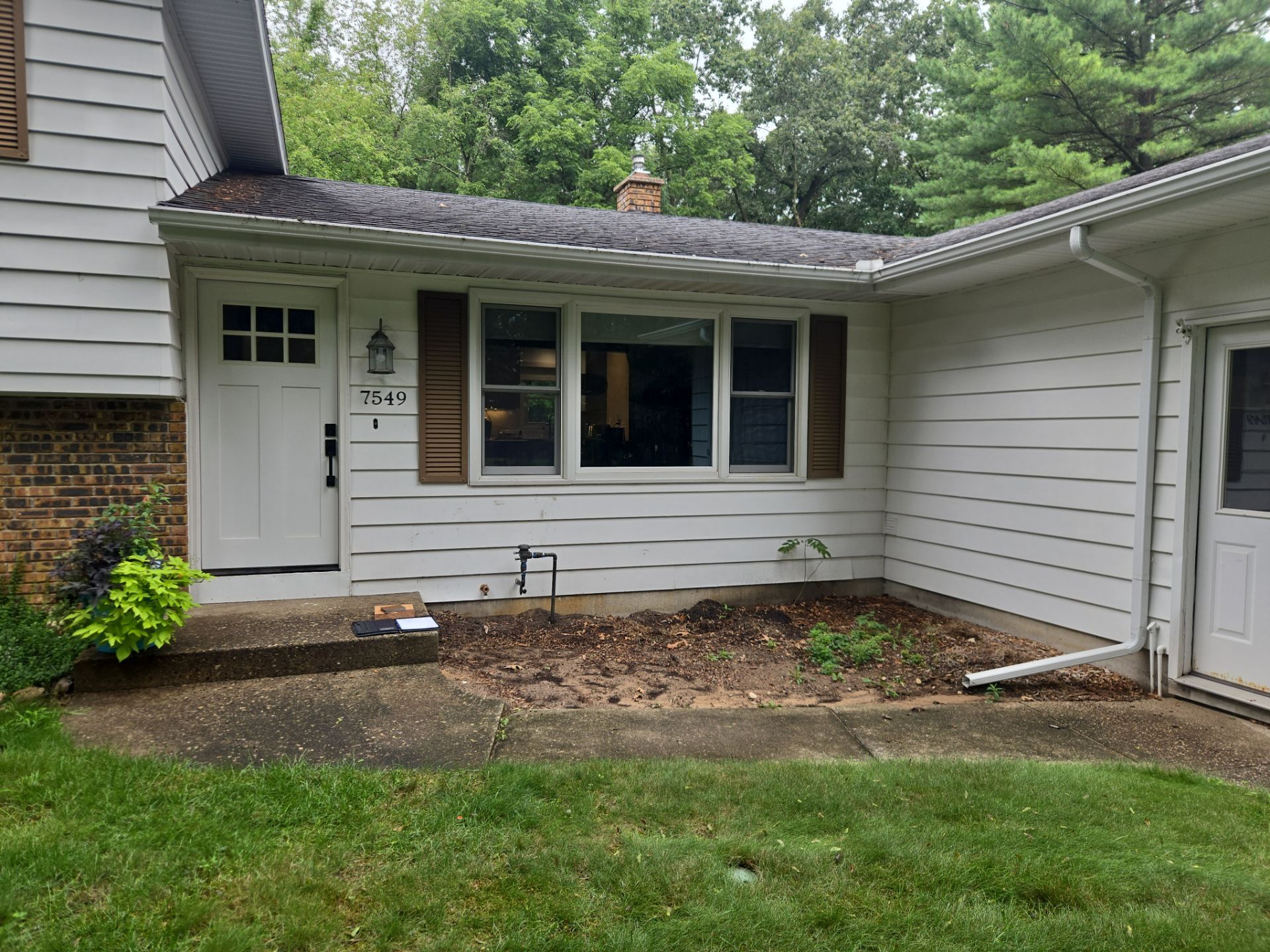 Exterior Remodel & Custom Deck by Cutting Edge Homes