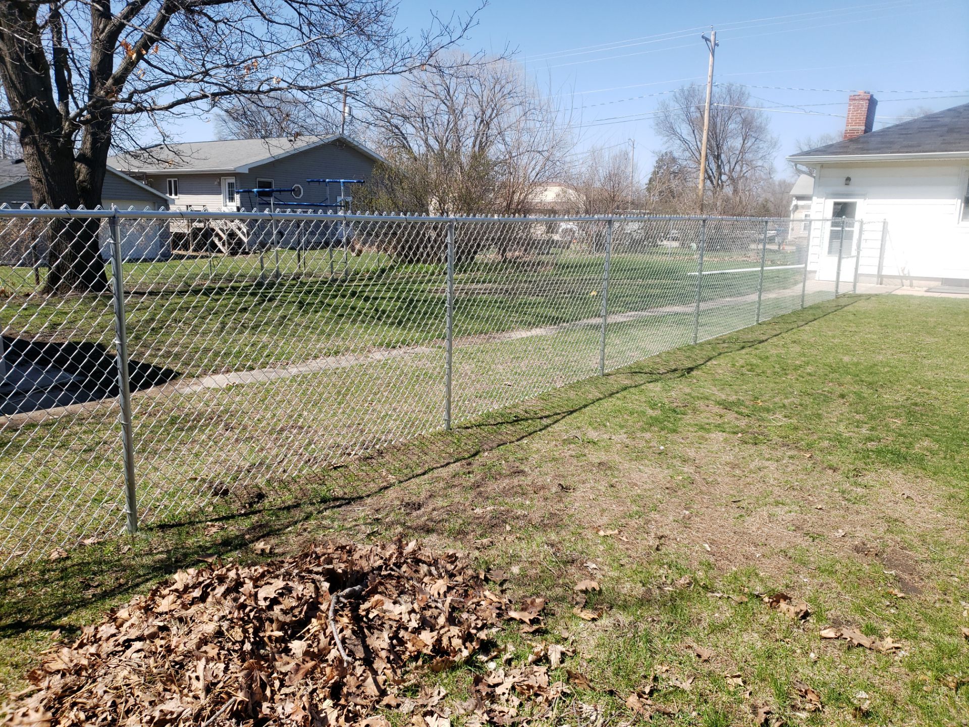 Residential Galvanized Chain Link Perimeter Fencing and Gate Installation by Perfect Picket Fence and Stain