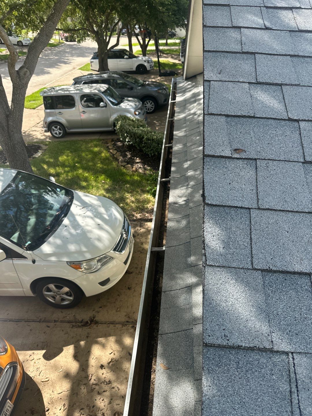 Hail Damage using Owen's Corning Duration (Lifetime) Shingles by Roof Repair Company