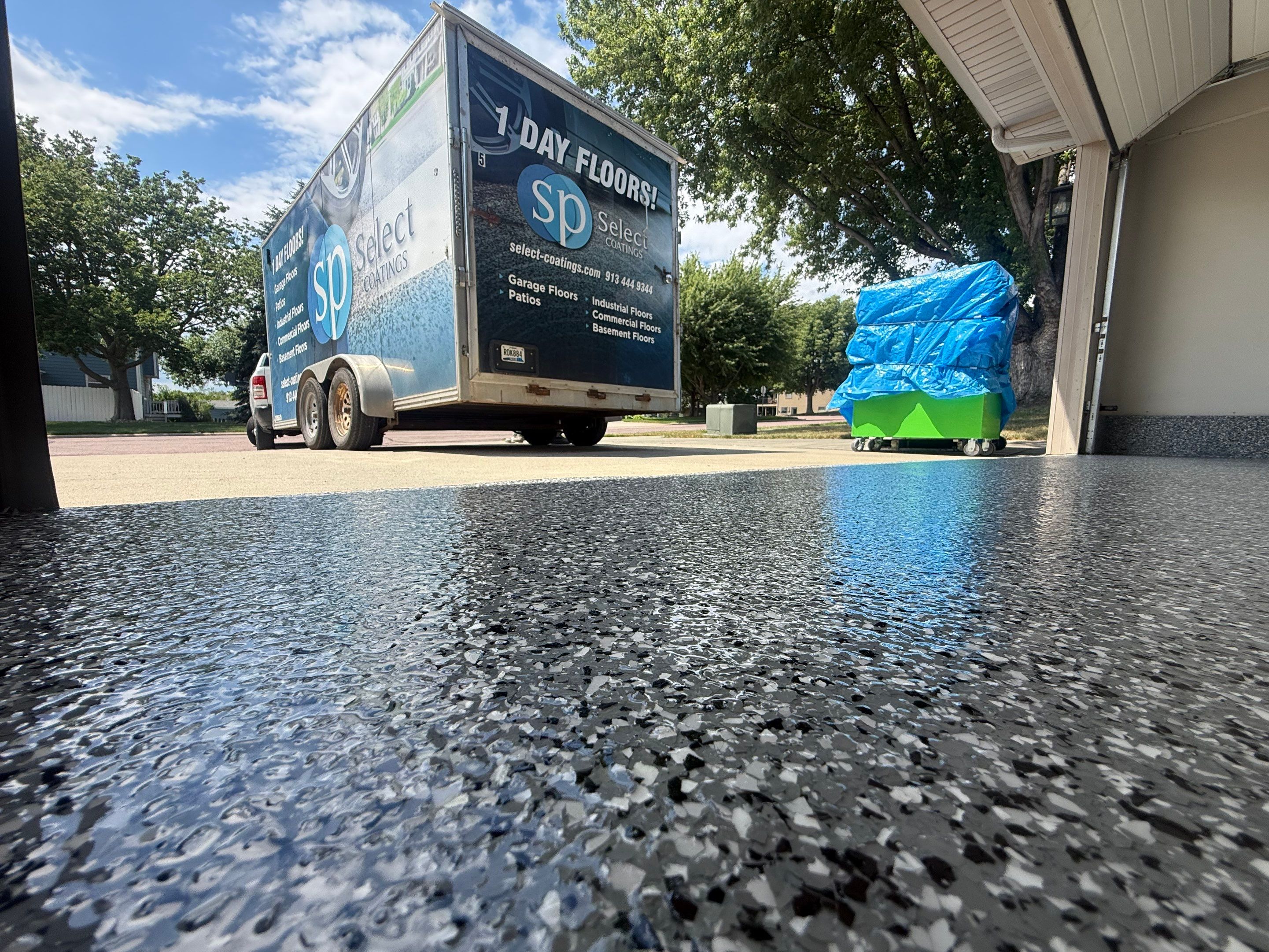 Smoke Flake Garage Floor Coating in Dell Rapids by Select Painting, Coatings & Garage Cabinets