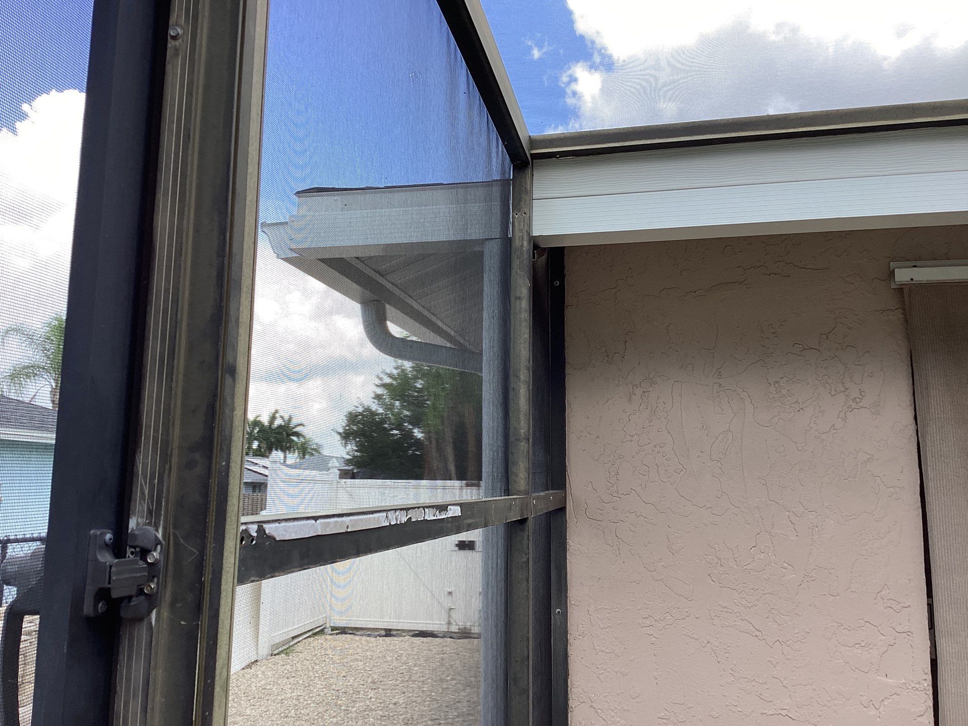 White Seamless Gutters and Splash Guards in Fort Myers FL by Gutter Professor by Gutter Professors