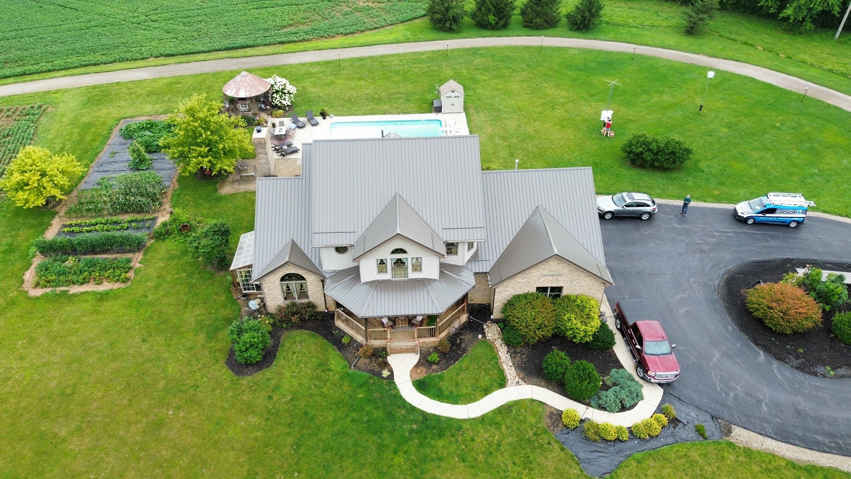 Residential Roofing Installation using Performance Panel Metal - Burnished Slate by RoofX 