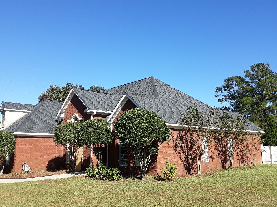 Residential Roofing Installation using Roof Replacement by American Roofing & Construction LLC