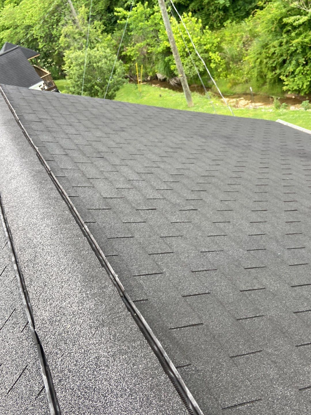 Residential Roofing Installation using Performance Shingles by Mr. Roofer