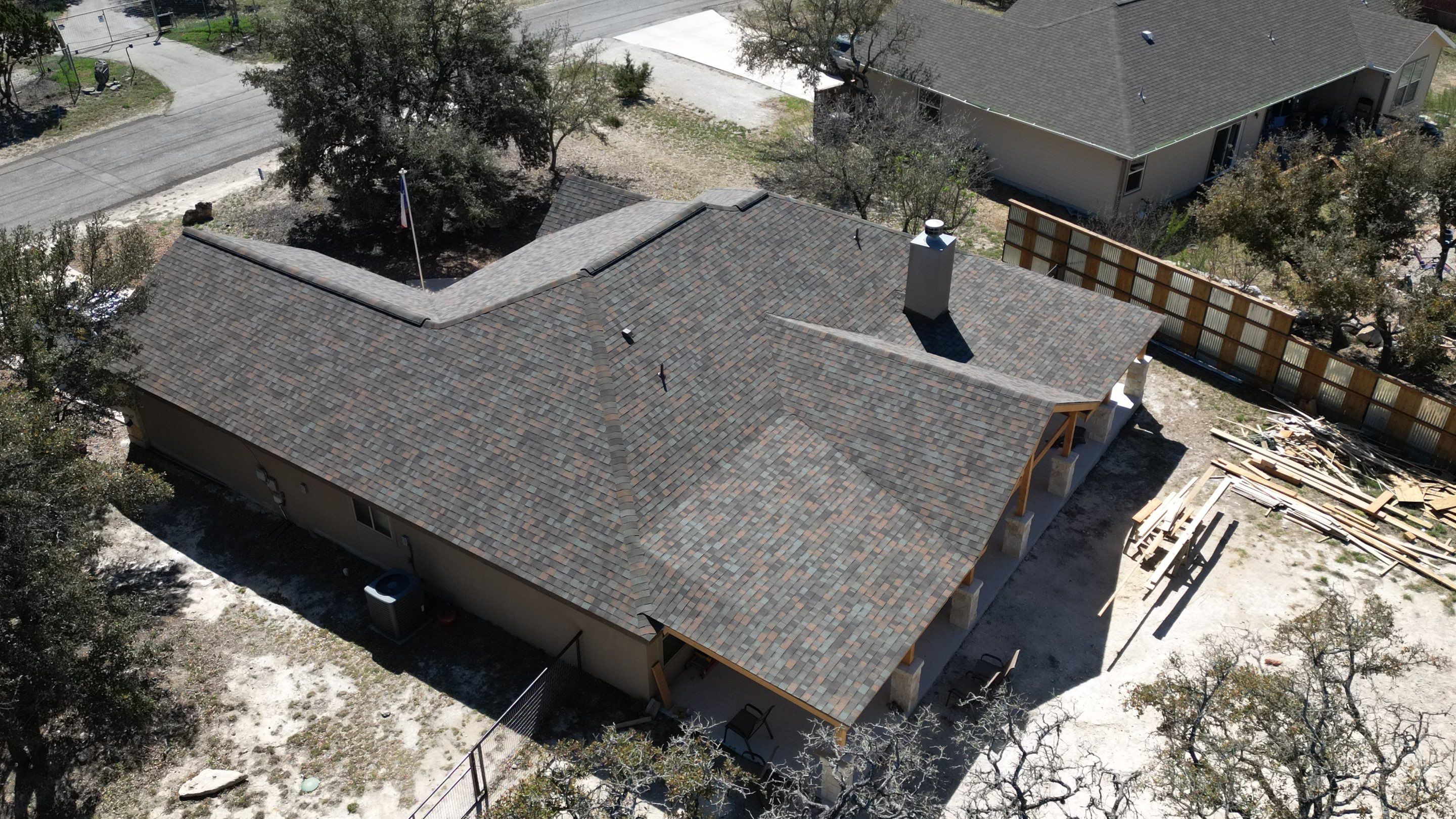 Reroof with Back Patio Addition using Owens Corning Duration Aged Copper by Lightning Exteriors