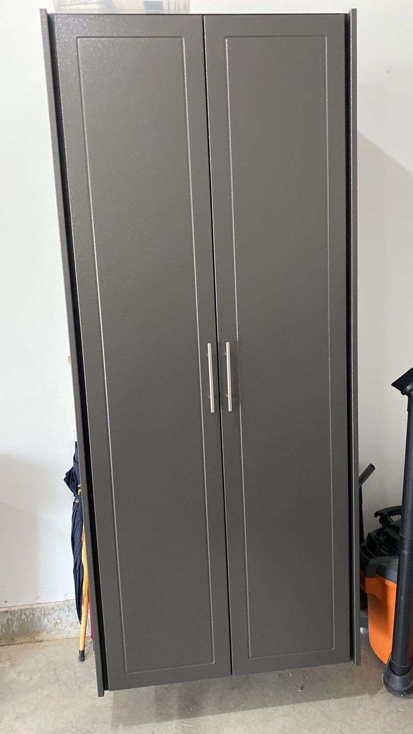 Michael W. adds storage to his garage! by Banner Garage