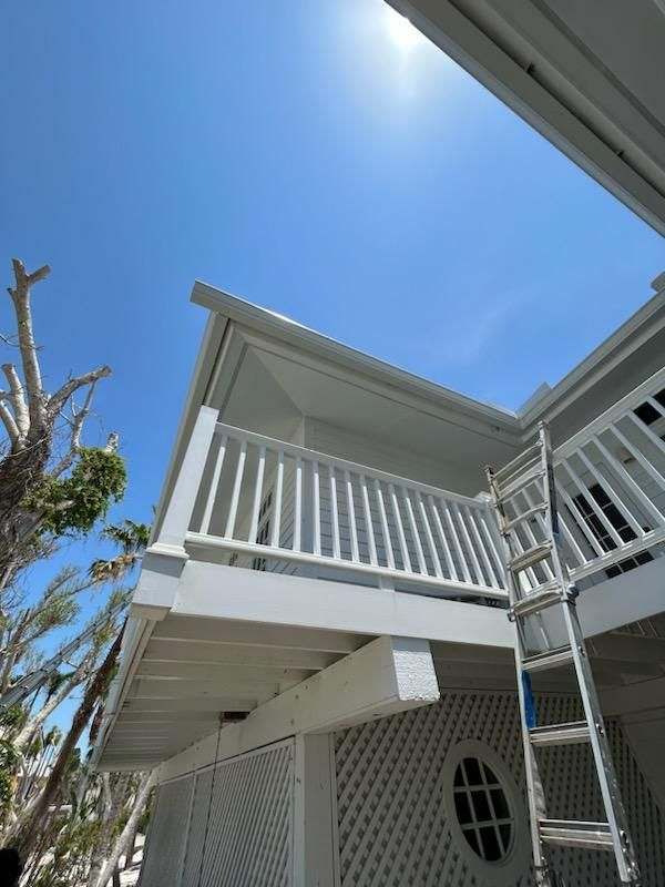 White Gutter Installation in Sanibel FL by Gutter Professors