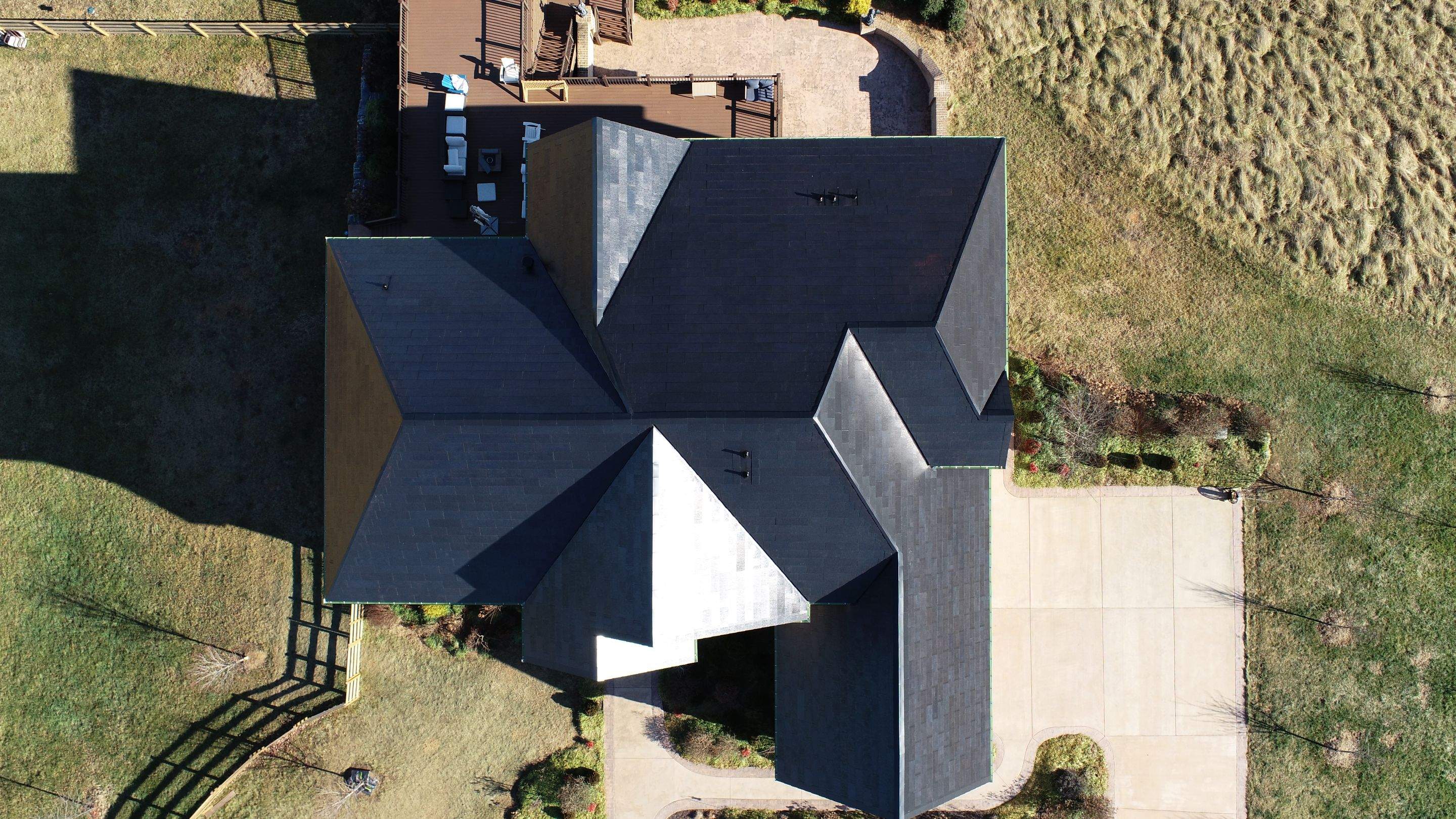Tesla Solar Roof Replacement by American Home Contractors