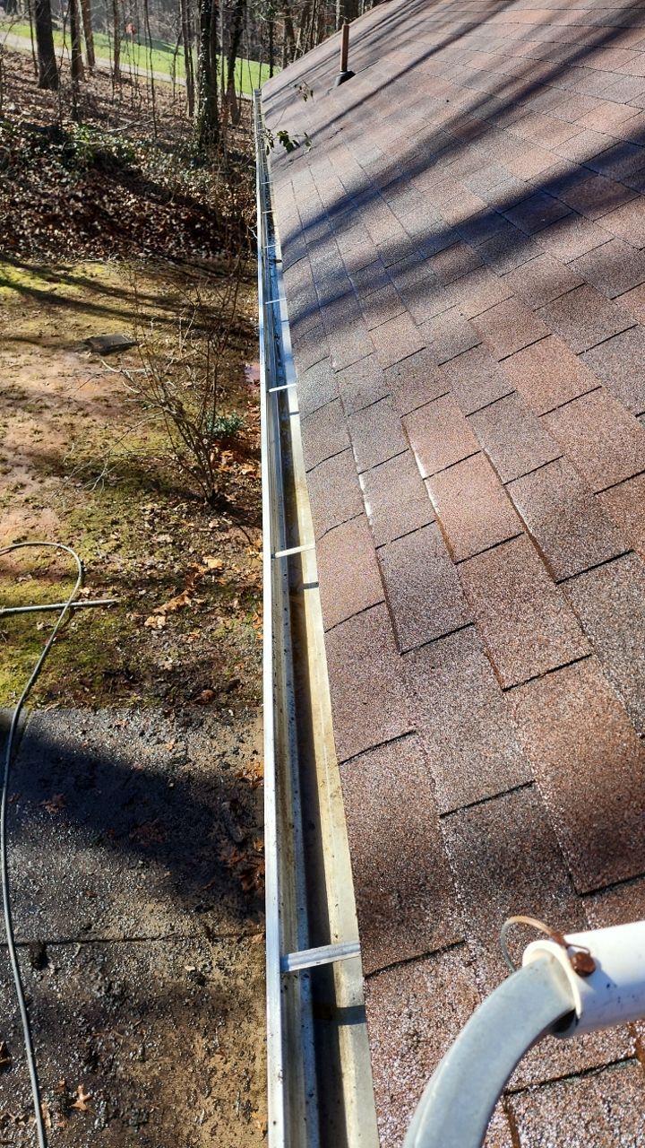 Gutter and Roof cleaning using cleaner by G&H Home Tech Pros LLC