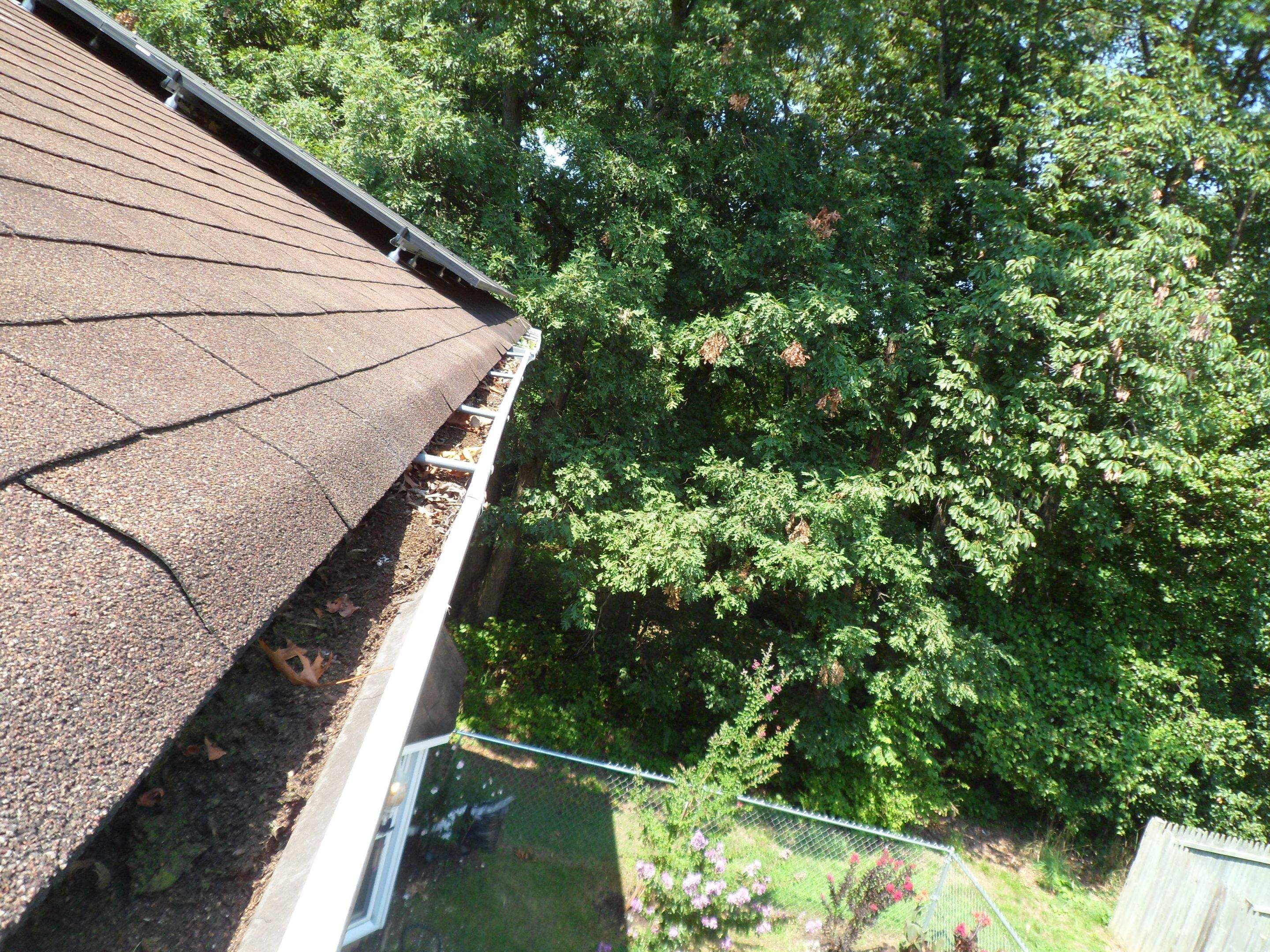 Residential Roofing Installation using Landmark Shingles Color Weatherwood by Alpha Design Services