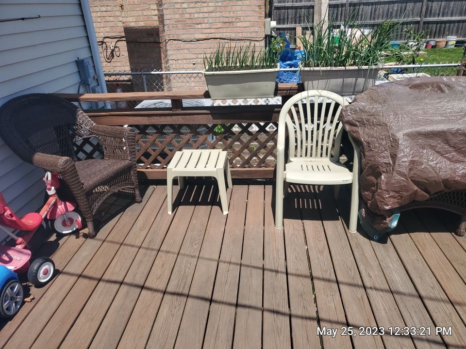 Wood cleaning and staining using Armstrong cloark oil stain by Northern Power Washing LLC.