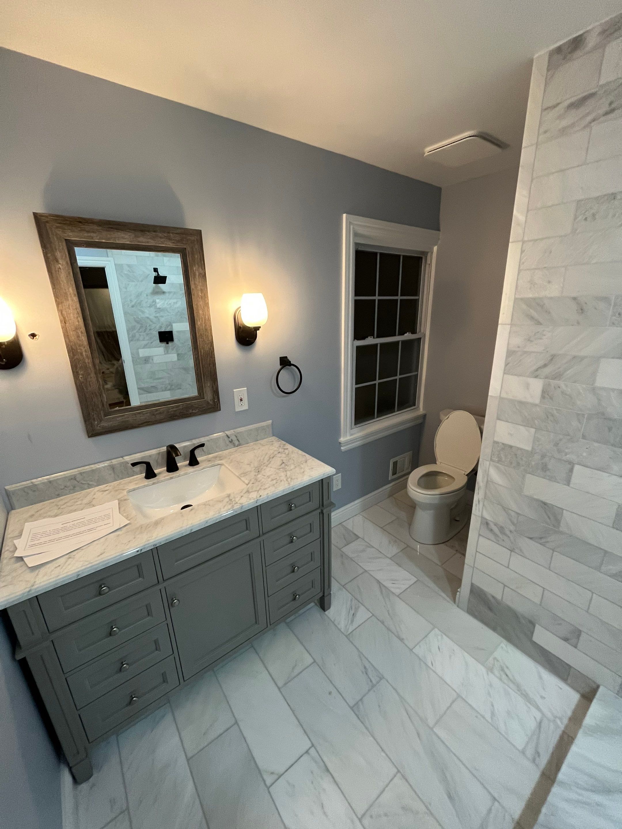 Bathroom Remodel using Tile by Home Concepts Construction