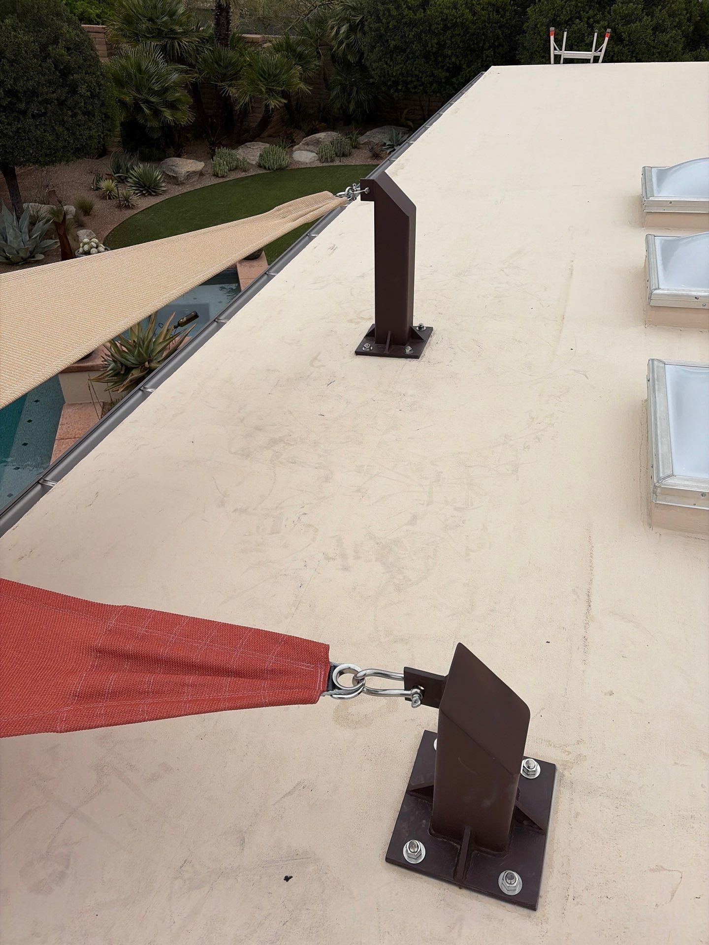 East pergola and shade sail addition 2026 by Arizona Awnings & Canvas 
