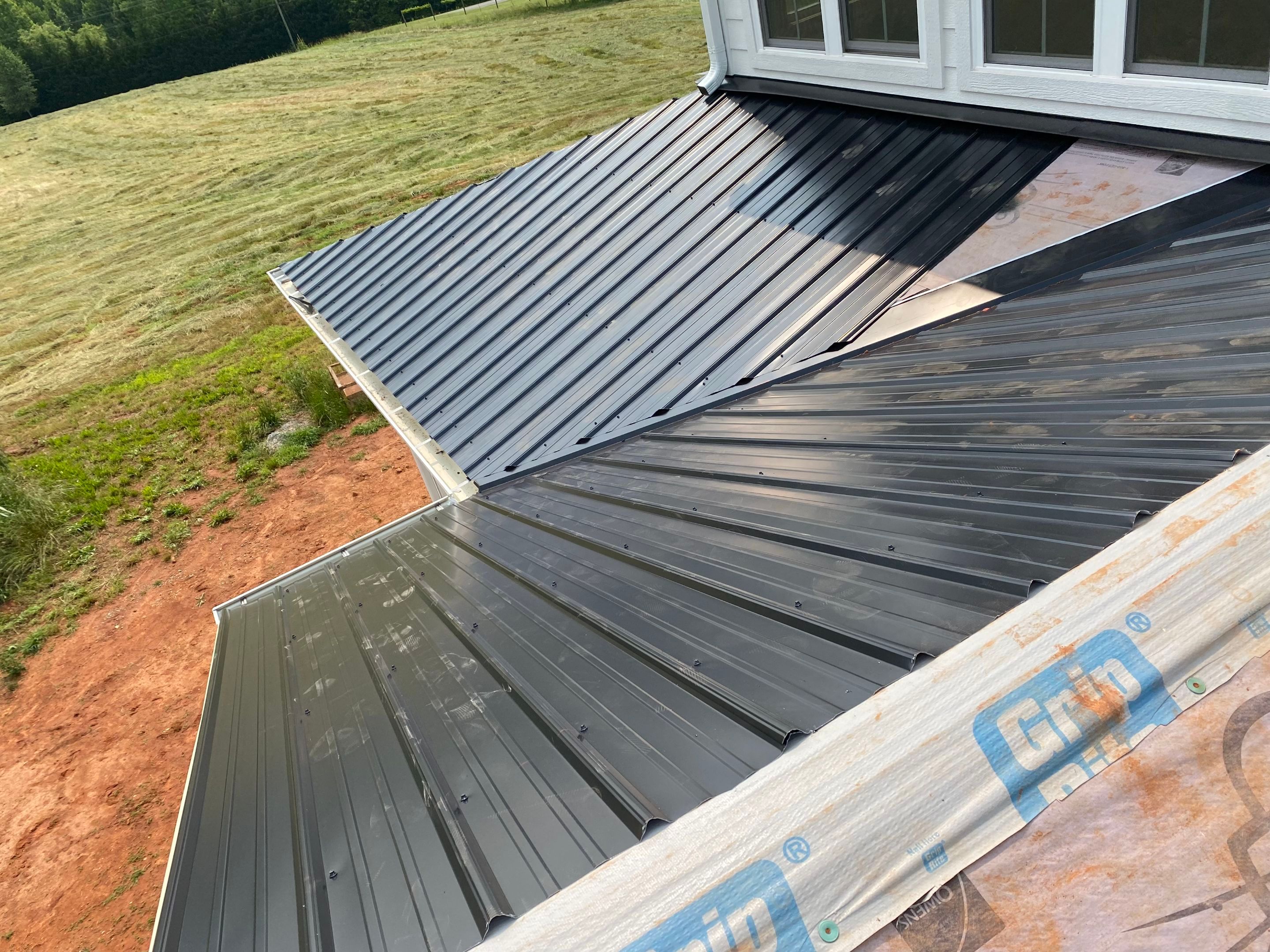 Jason's metal porch roof by BROCK BUILDERS 