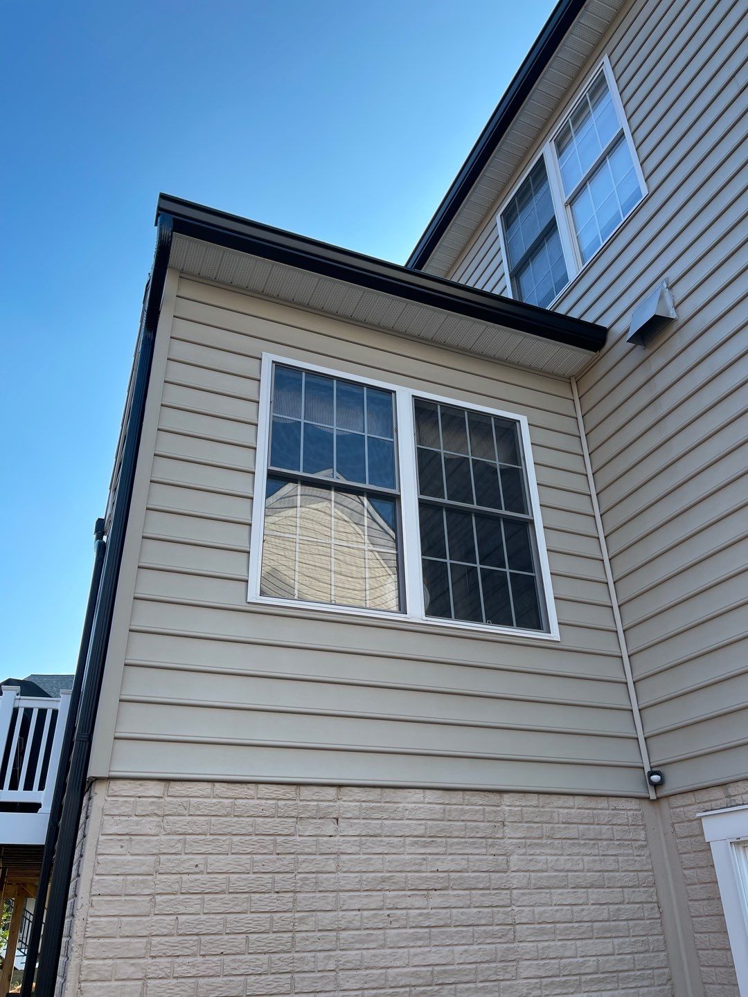 Tesla Solar Roof and Gutter Installation by American Home Contractors
