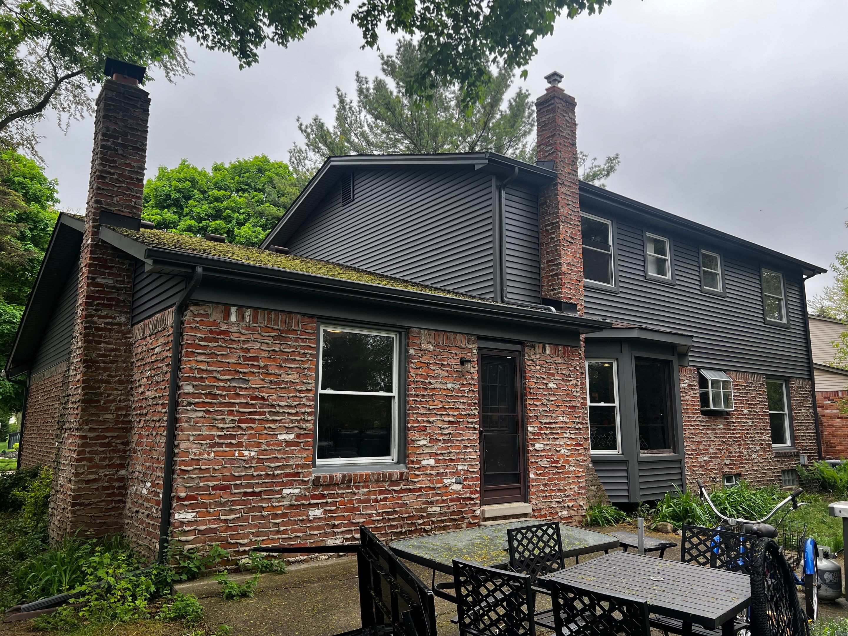 Siding Replacement  using Certainteed Monogram Vinyl D4" Smoky Gray color by Bloomfield Construction & Restoration