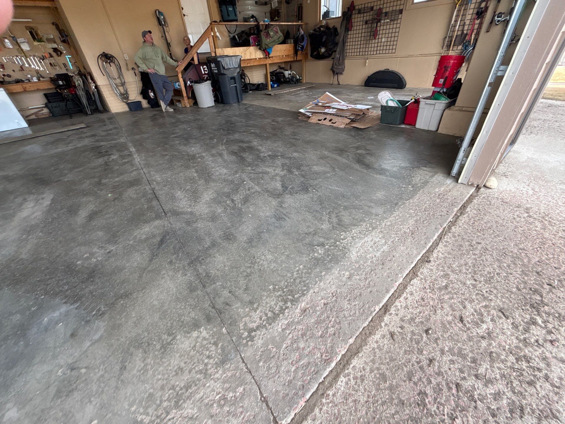 Residential Garage Floor Transformation with Speckled Epoxy Coating by Select Painting, Coatings & Garage Cabinets