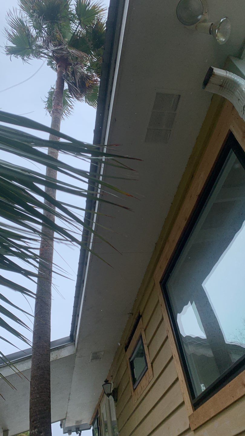 Seamless Gutter Installation using Charcoal Grey Gutters by Gutter Professors