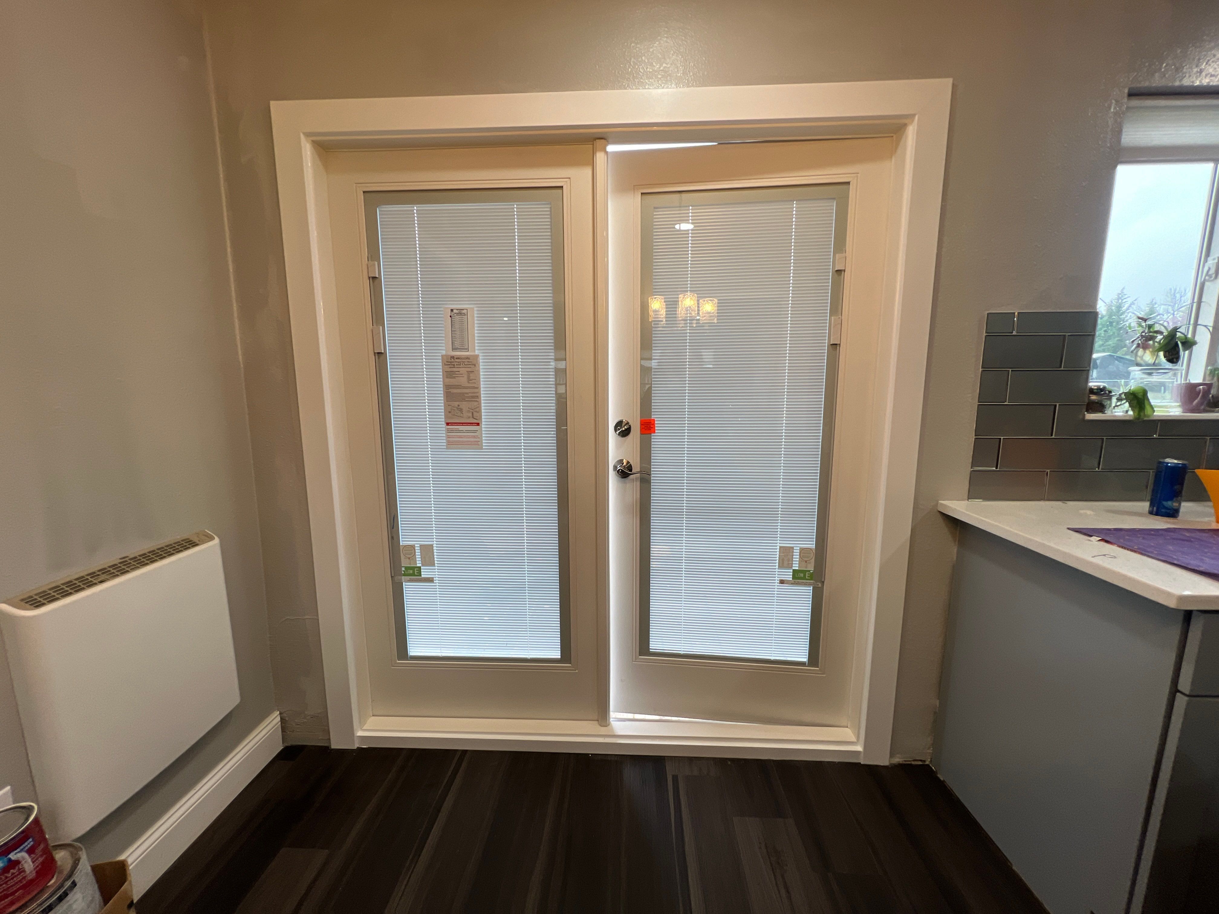 Door Installation using French Door by Villegas Remodeling, LLC