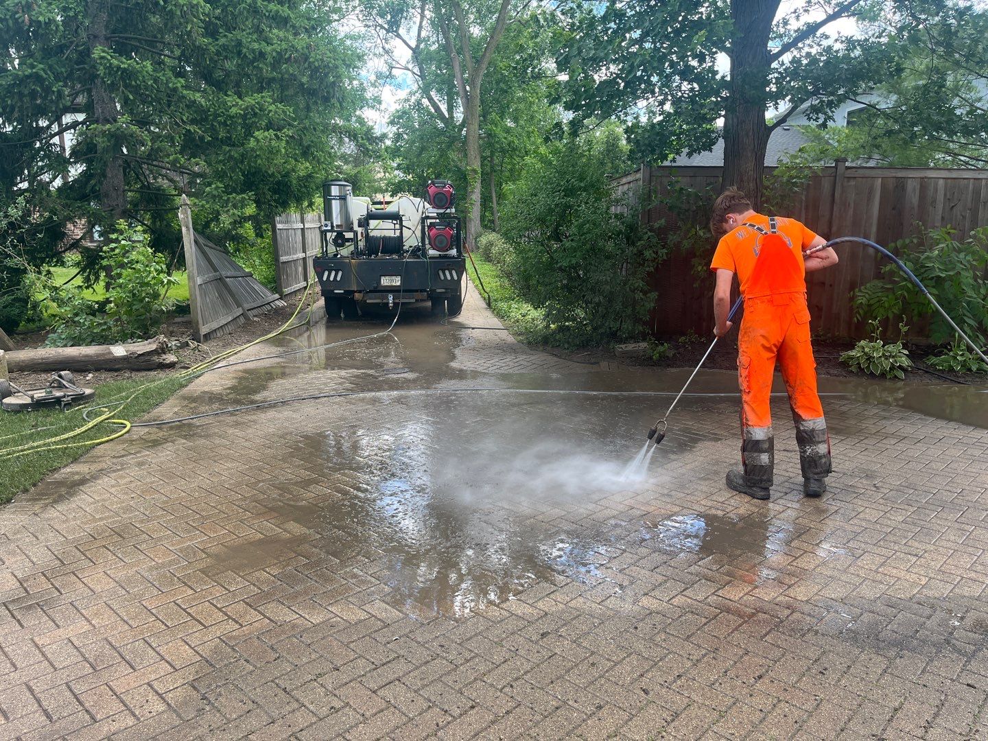 Brick paver repair, cleaning and sealing by Northern Power Washing LLC.