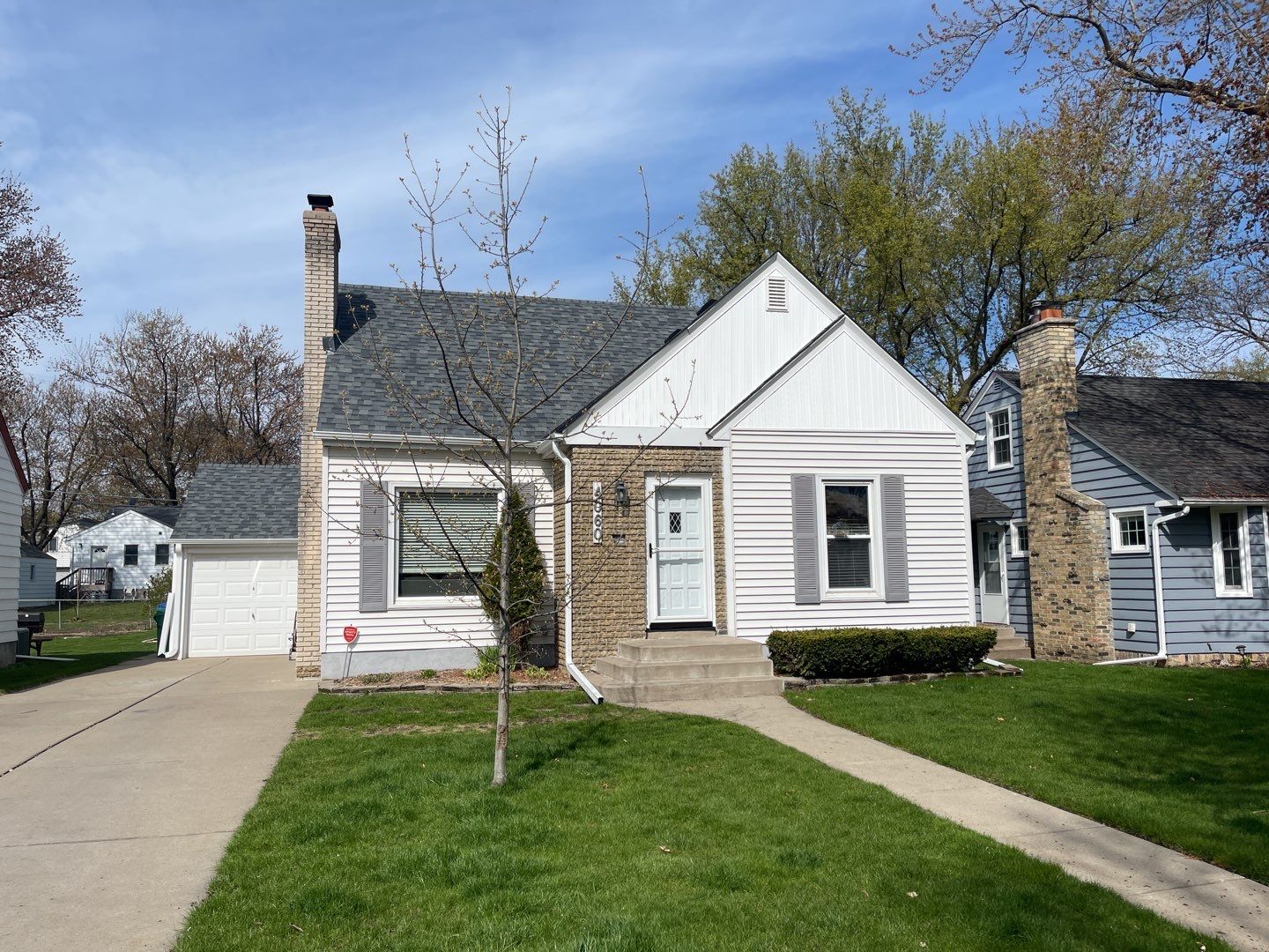 Saint Louis Park, MN – Roof and Gutter Replacement by First Impressions Exteriors