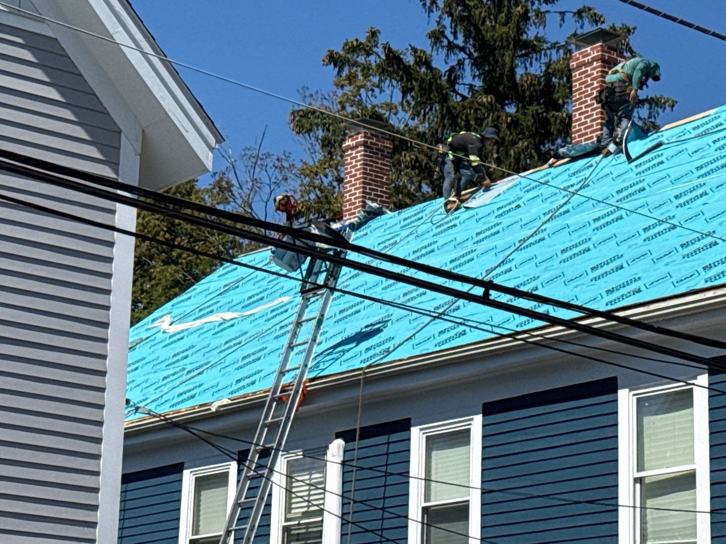 Half Roof Replacement for Solar Installation – Townhouse with New Plywood Decking by Sensible Home Solutions