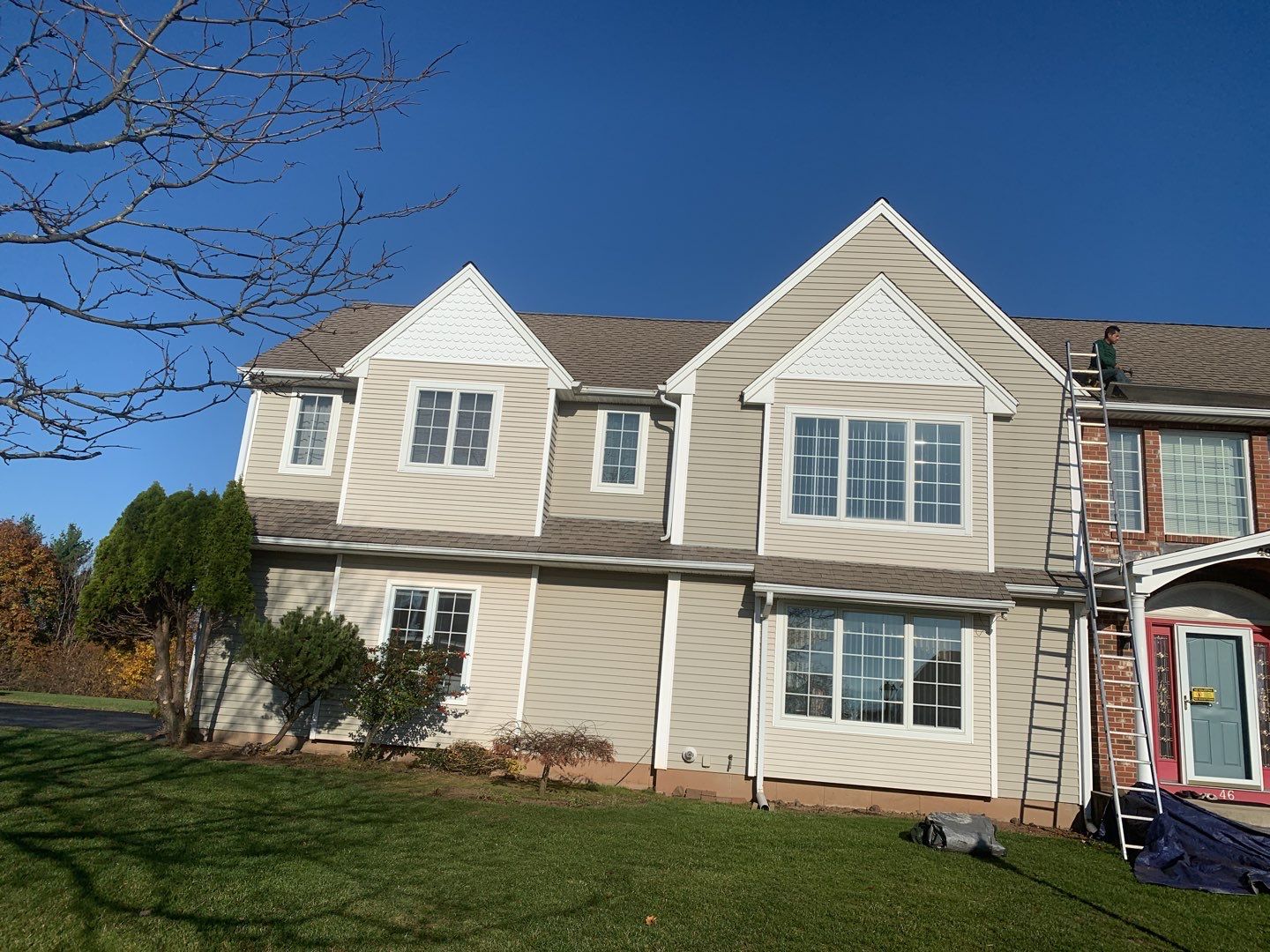 Commercial Roofing Installation using Owens Corning TruDefinition driftwood by A Plus Exterior