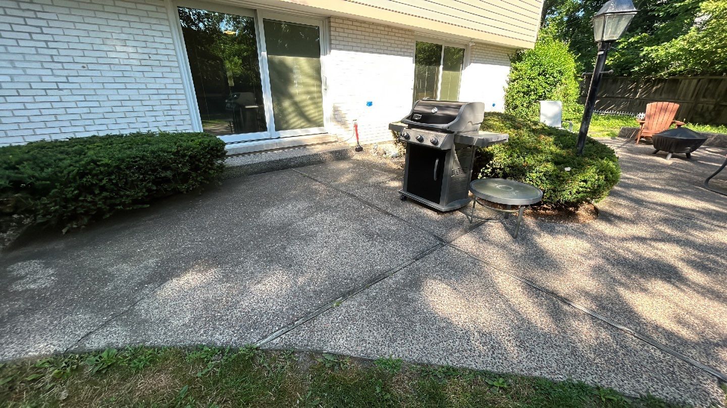 Aggregate concrete cleaning and sealing using Surebond SB-9000 by Northern Power Washing LLC.