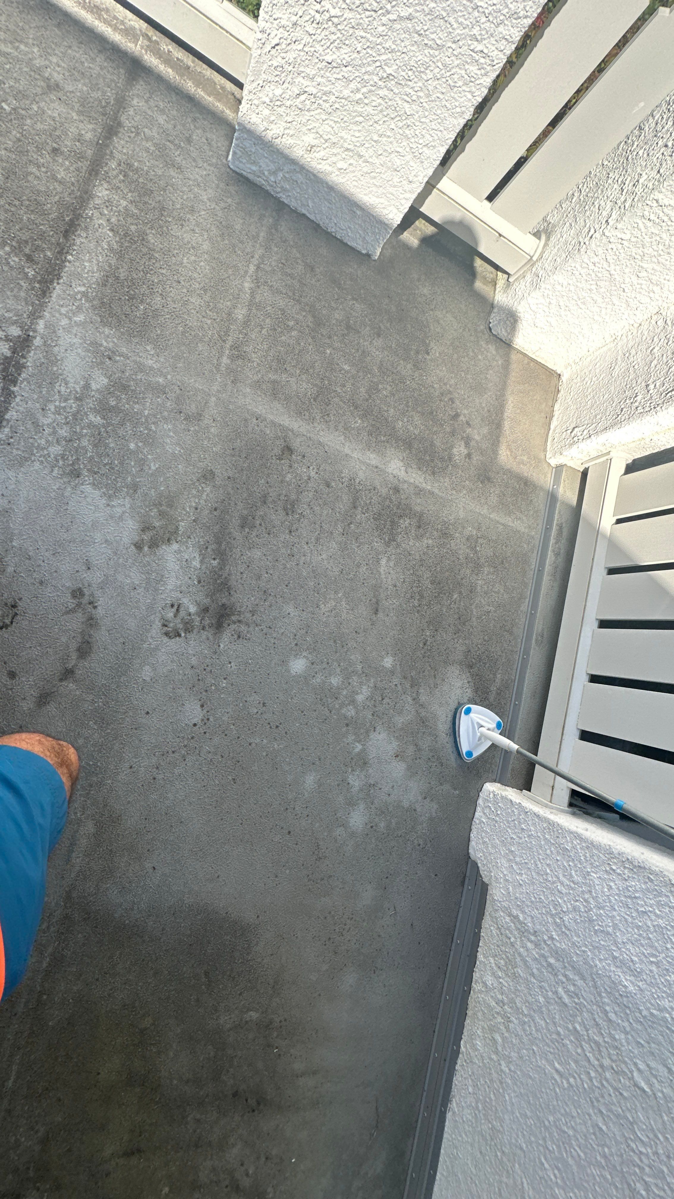 Stucco House Washing and Concrete Balcony Cleaning in Baltimore by Baltimore Pressure Washers Inc.