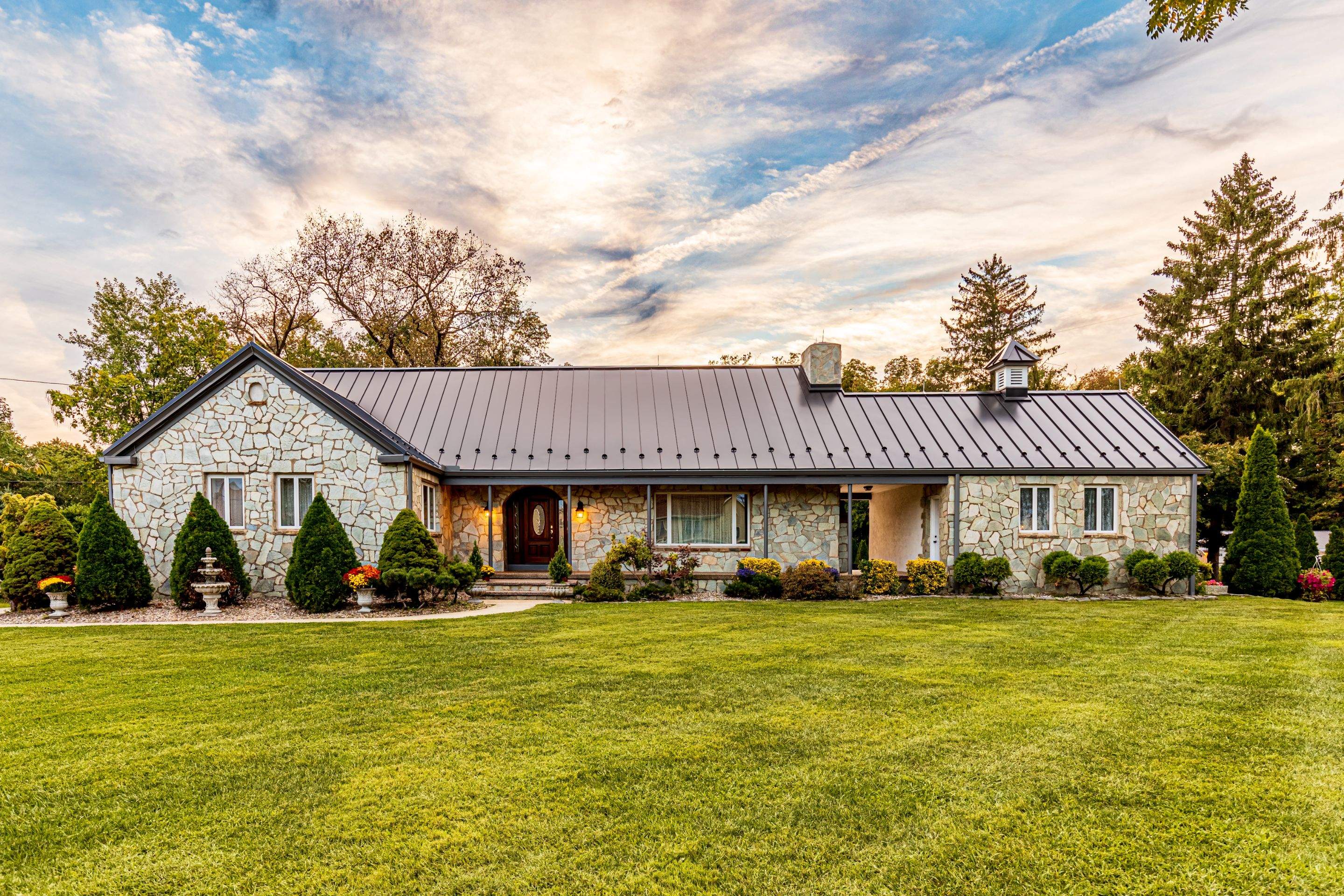 Standing Seam Metal roof-black by Esh Builders