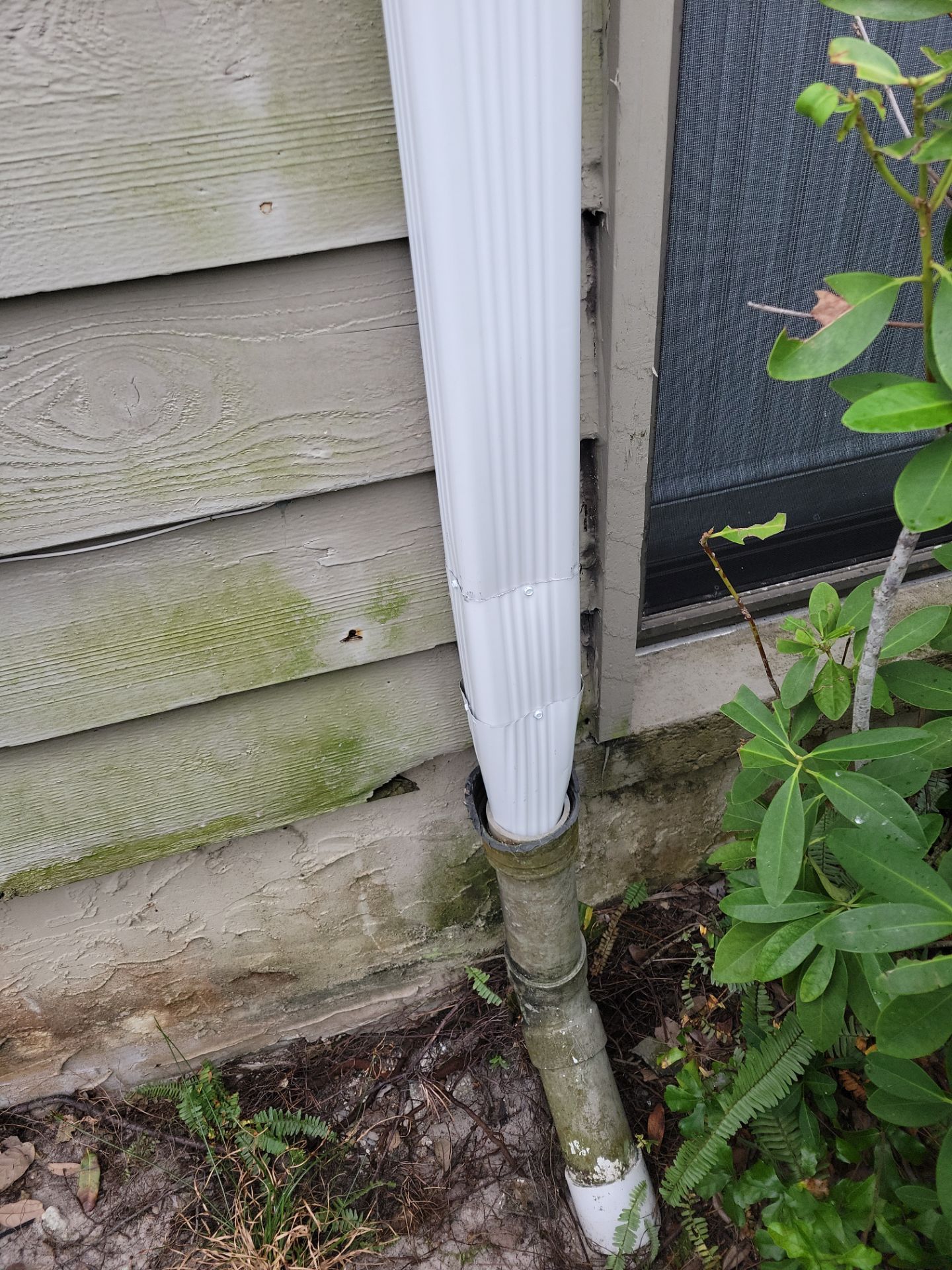 White Gutters Repair and Installation in Sarasota FL by Gutter Professors