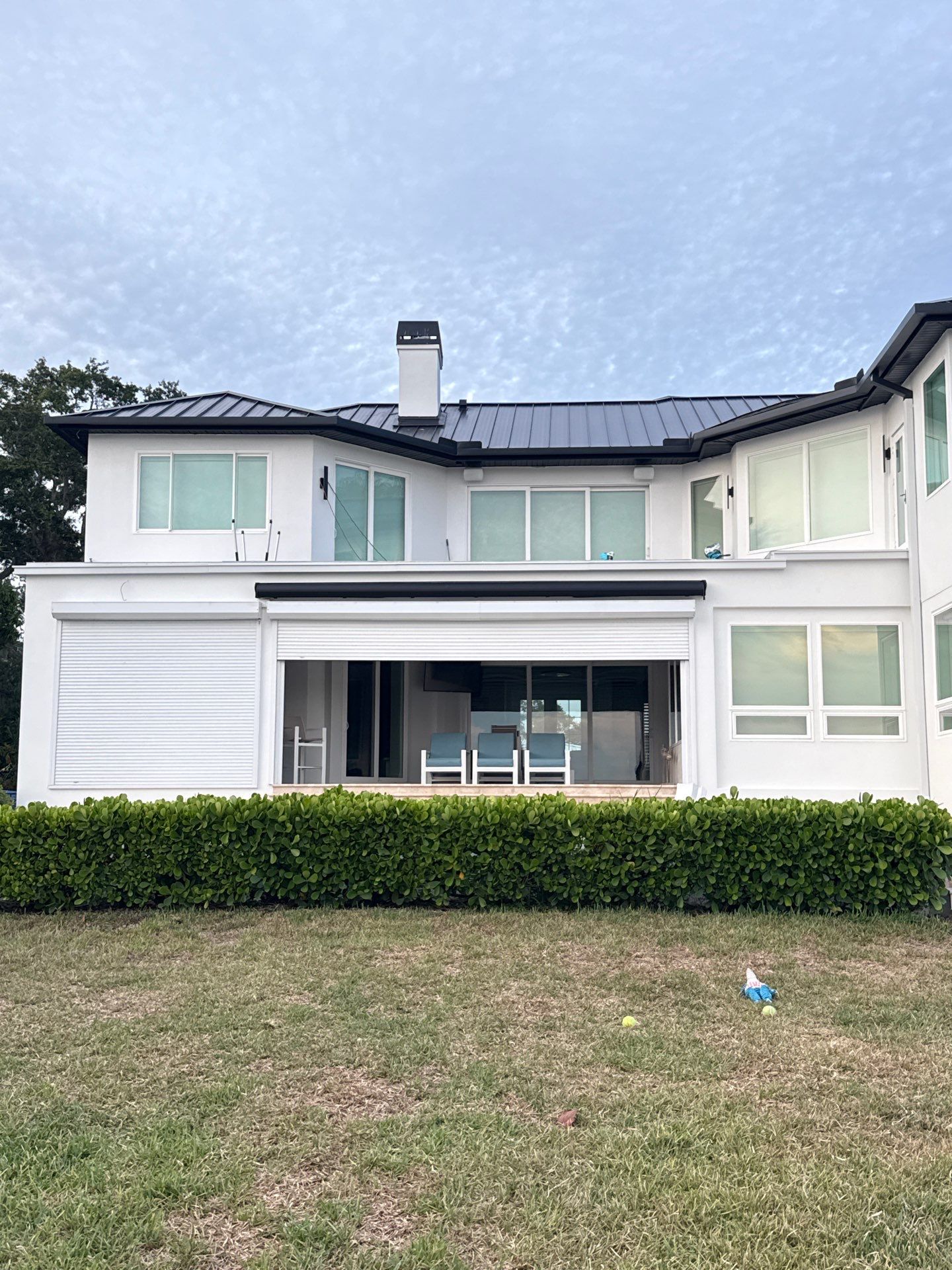 Soffit and Fascia Installation and black seamless gutters in Sarasota FL by Gutter Professors
