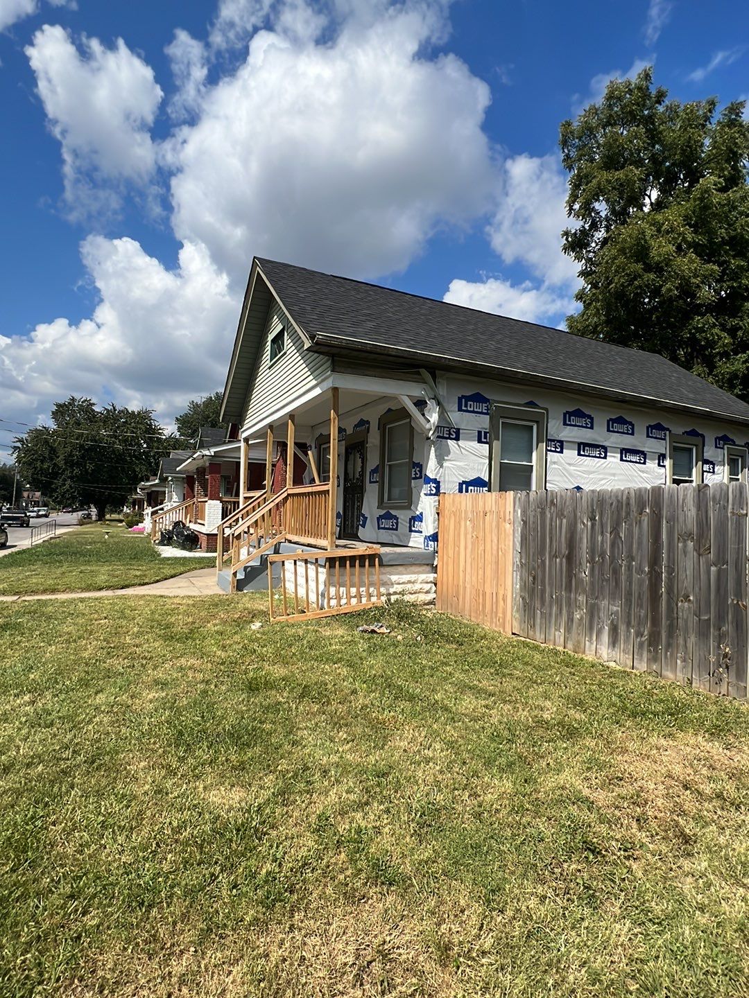 Rental Property Restoration, siding, flooring, gutters, landscaping by Storm Contracting 