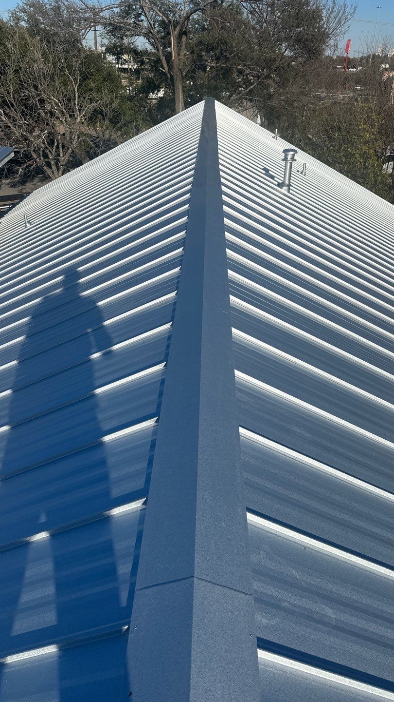 Commercial Roofing Installation using 24 GA Double-Lock - Galvalume by Action Exteriors Austin